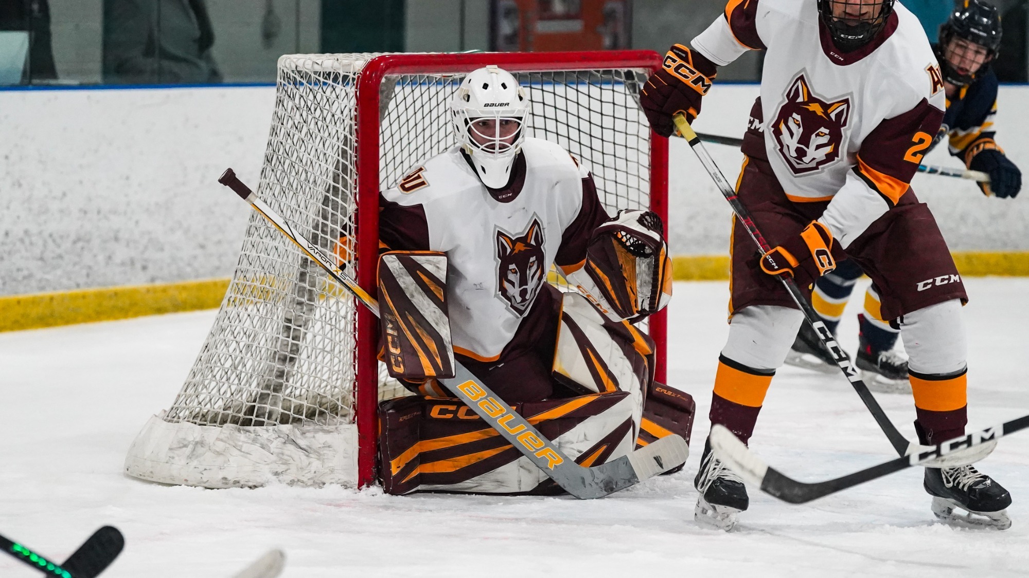 Connor Graham protects the net from the opposition