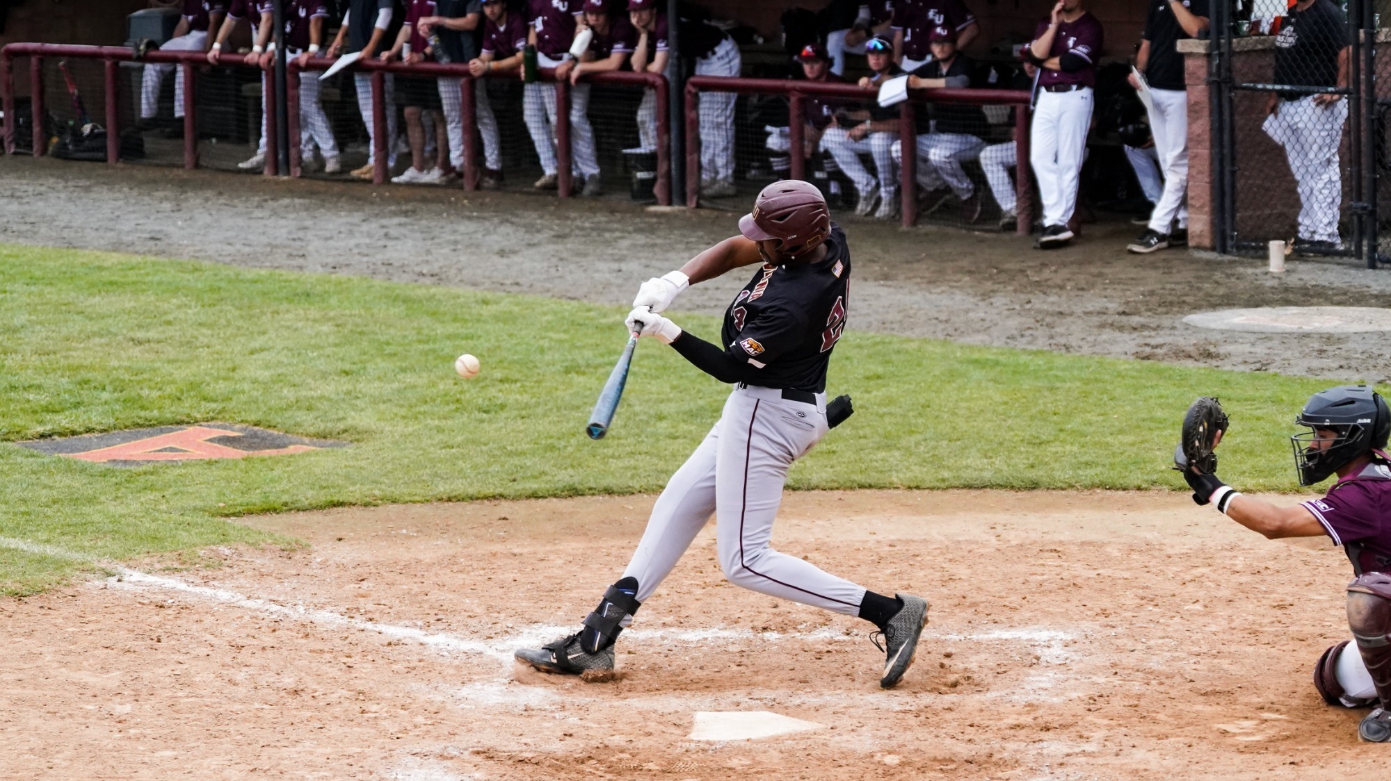 Harold Ivery III lines a ball into the outfield for a double against Eastern. 
