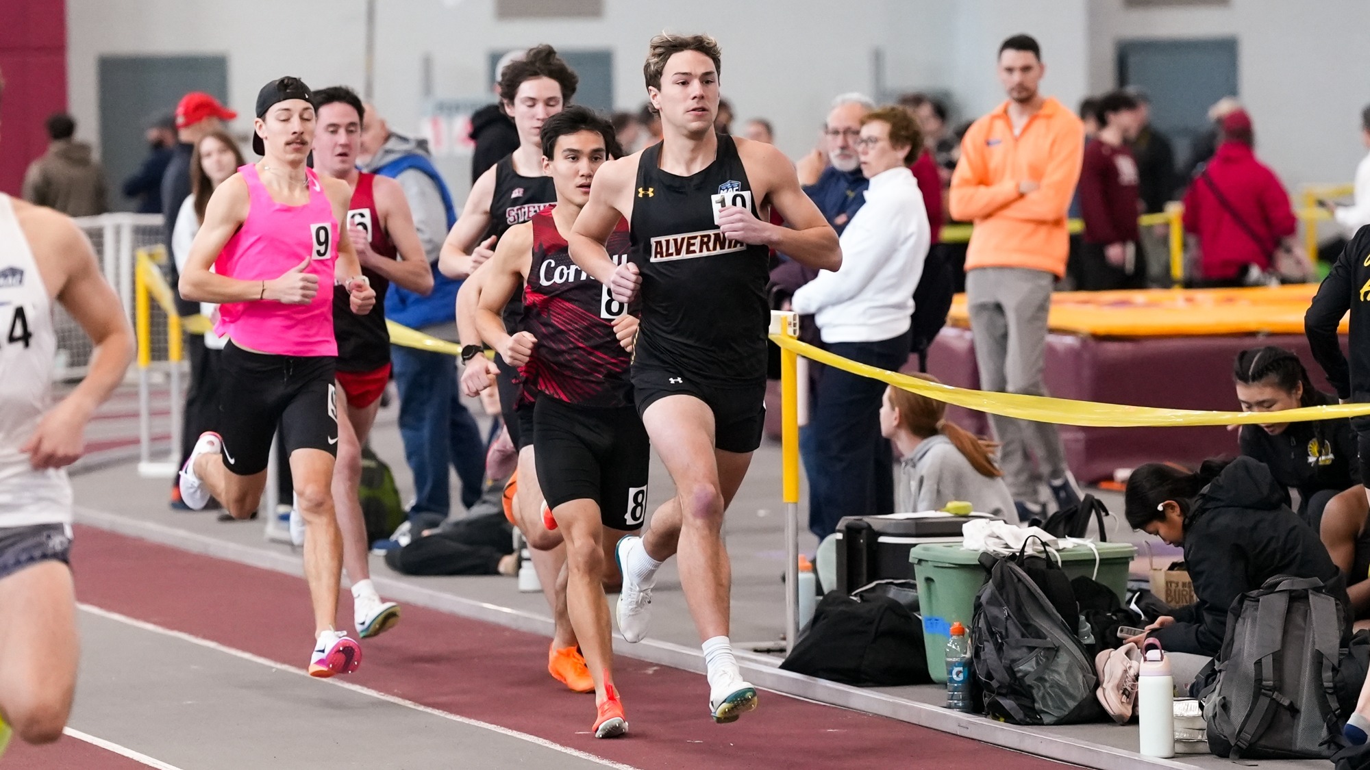 Spencer Hahn leads the pack in the 800 meter race