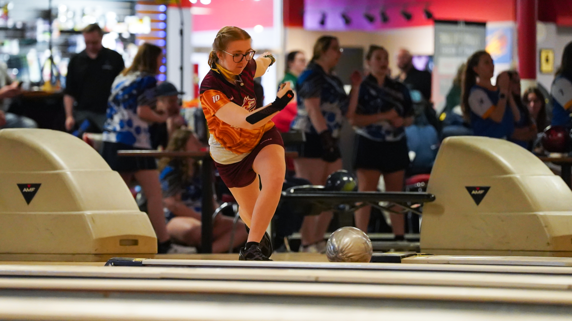 Lacey Slaymaker bowls a strike