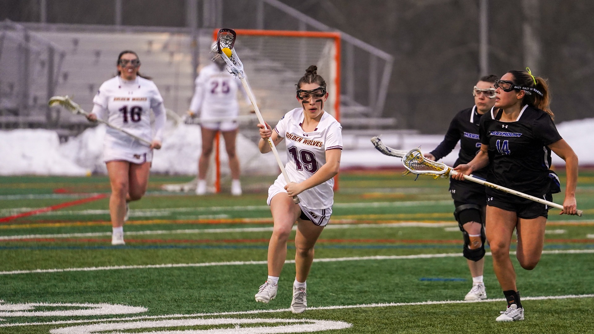 Kayleigh Kight runs down field against Marymount