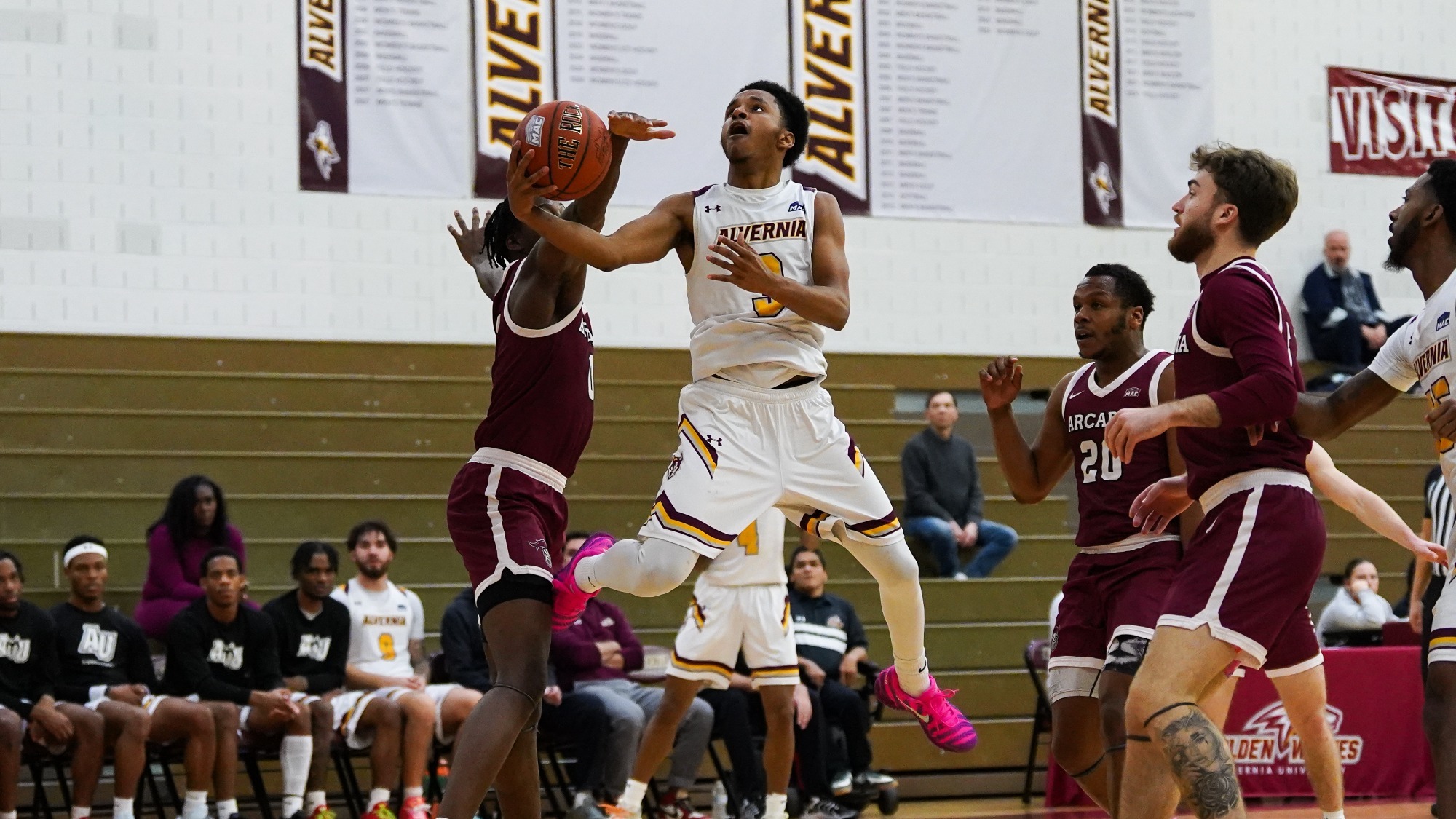 Robert Cottrell finishes a layup
