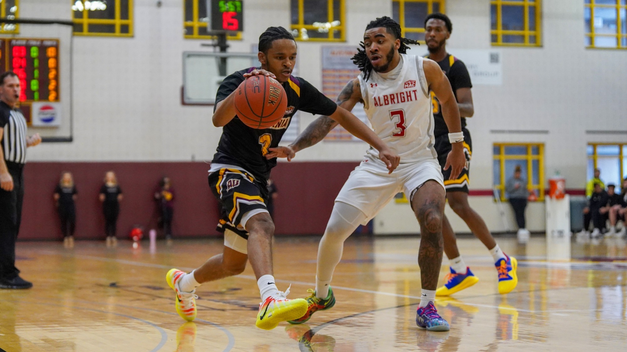 Robert Cottrell Dribbles by Albright Defender