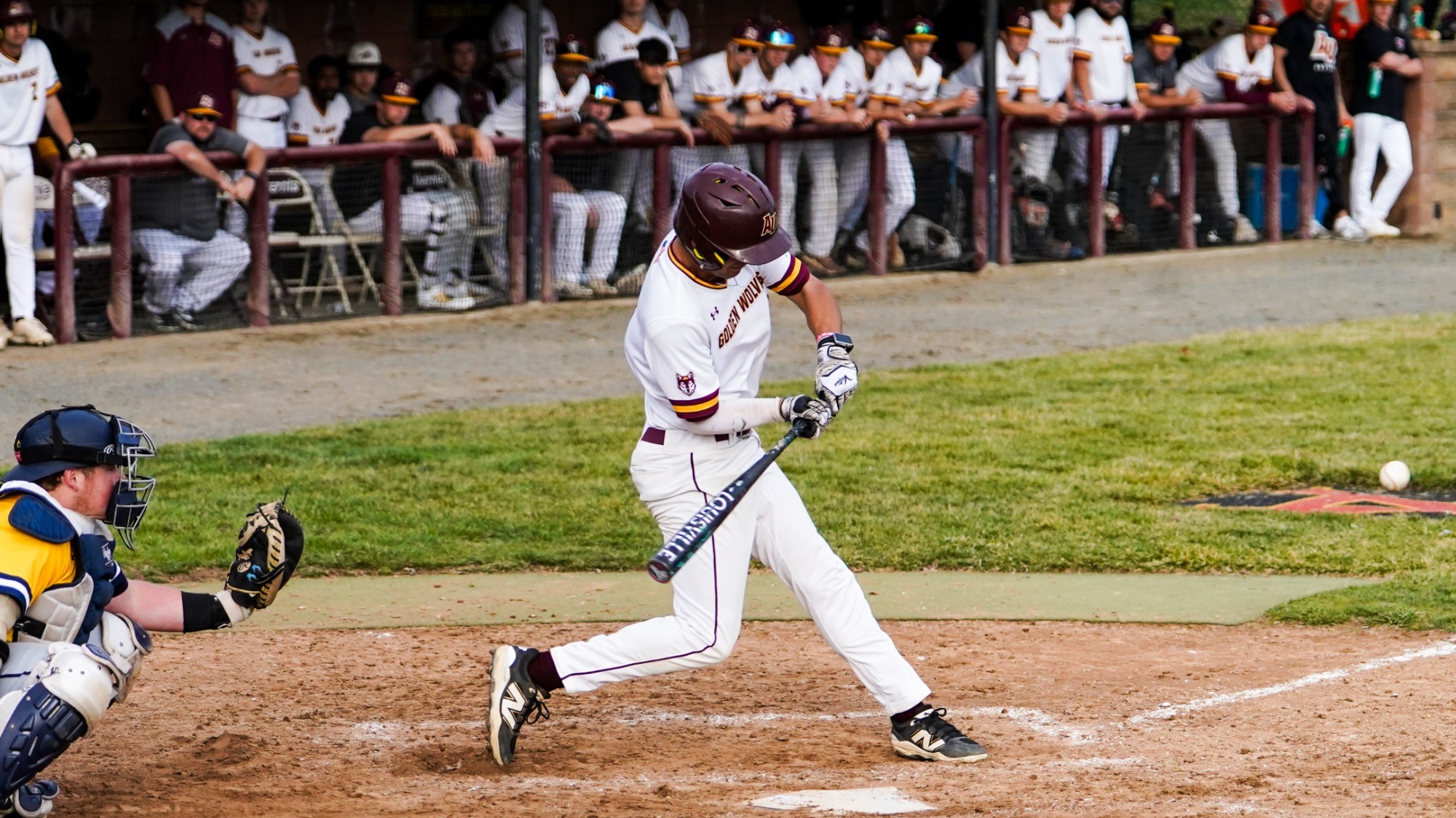 #4 Timmy Hitchcock rips a triple into the left center gap against Neumann down in Angelica Park.