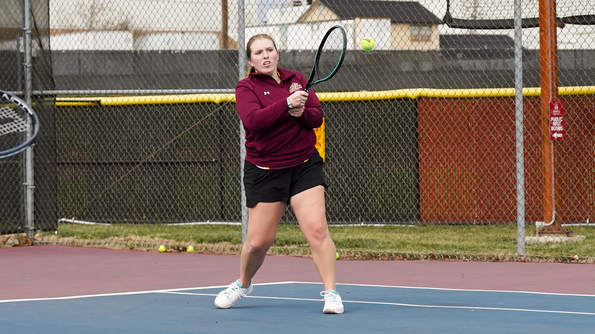 Jillian Laughman returns her opponents serve