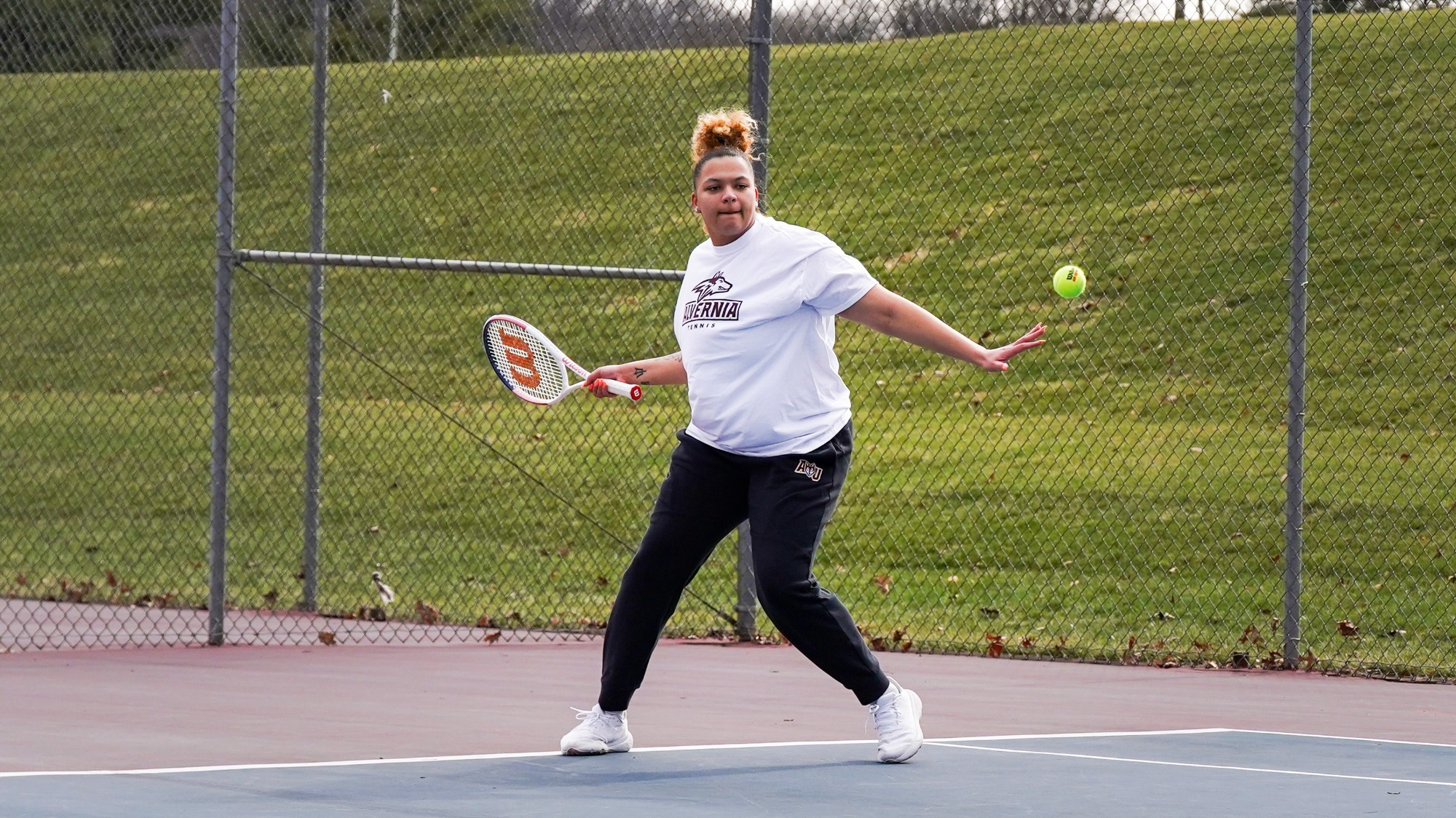 Jennah DeGout returns a shot against Kutztown