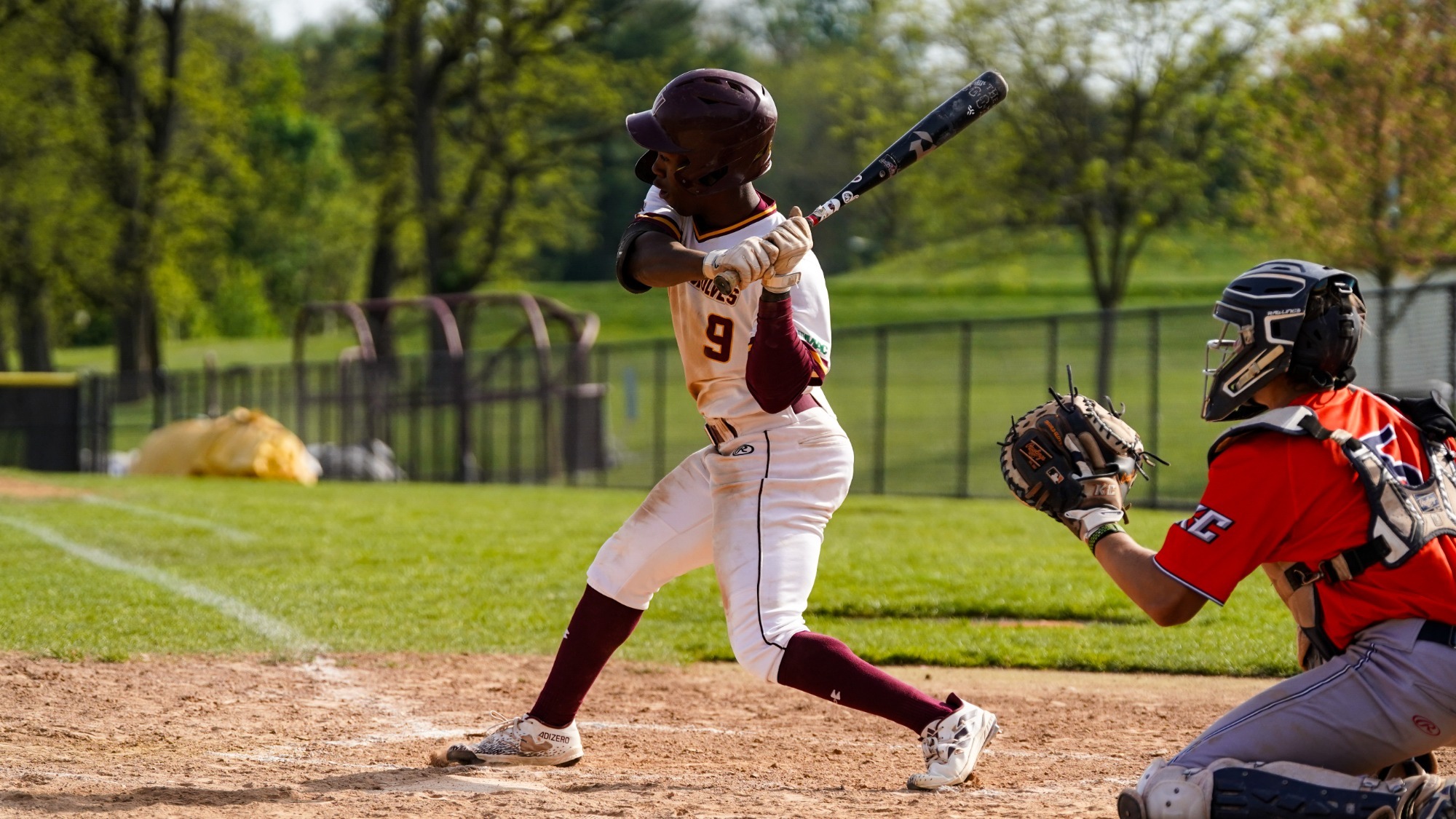 Quincy Esannason takes a cut at a pitch down in Angelica Park against Keystone College