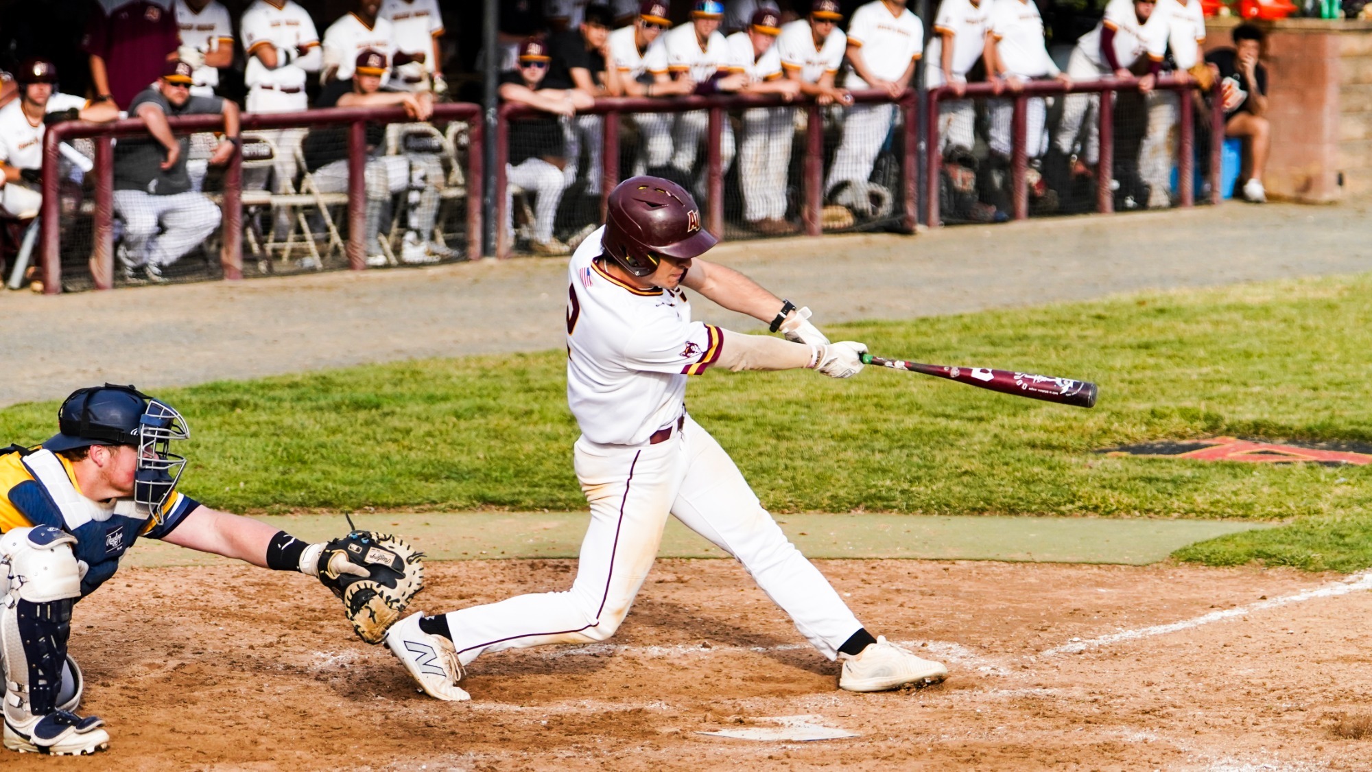 Jack Zabarsky takes a cut at a ball against Neumann in Angelica Park.