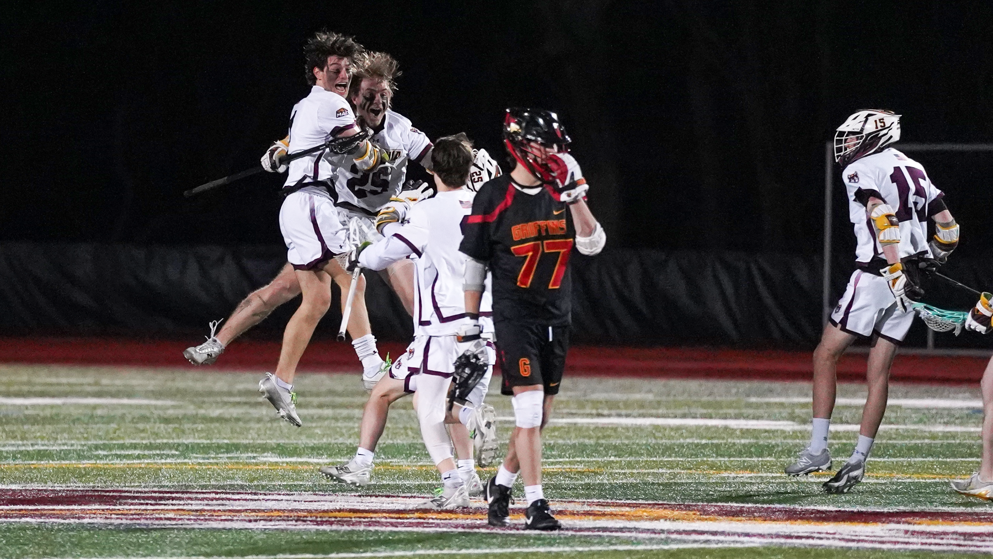 Men's Lacrosse celebrates their 2OT Victory