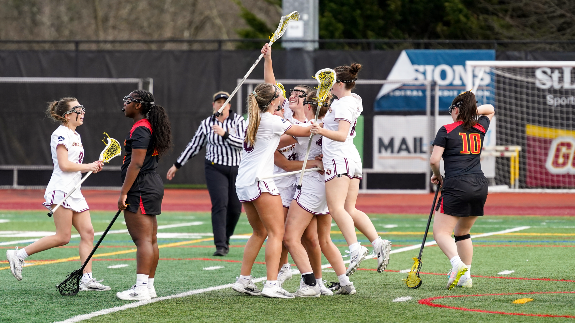 Women's Lacrosse Celebrate a goal