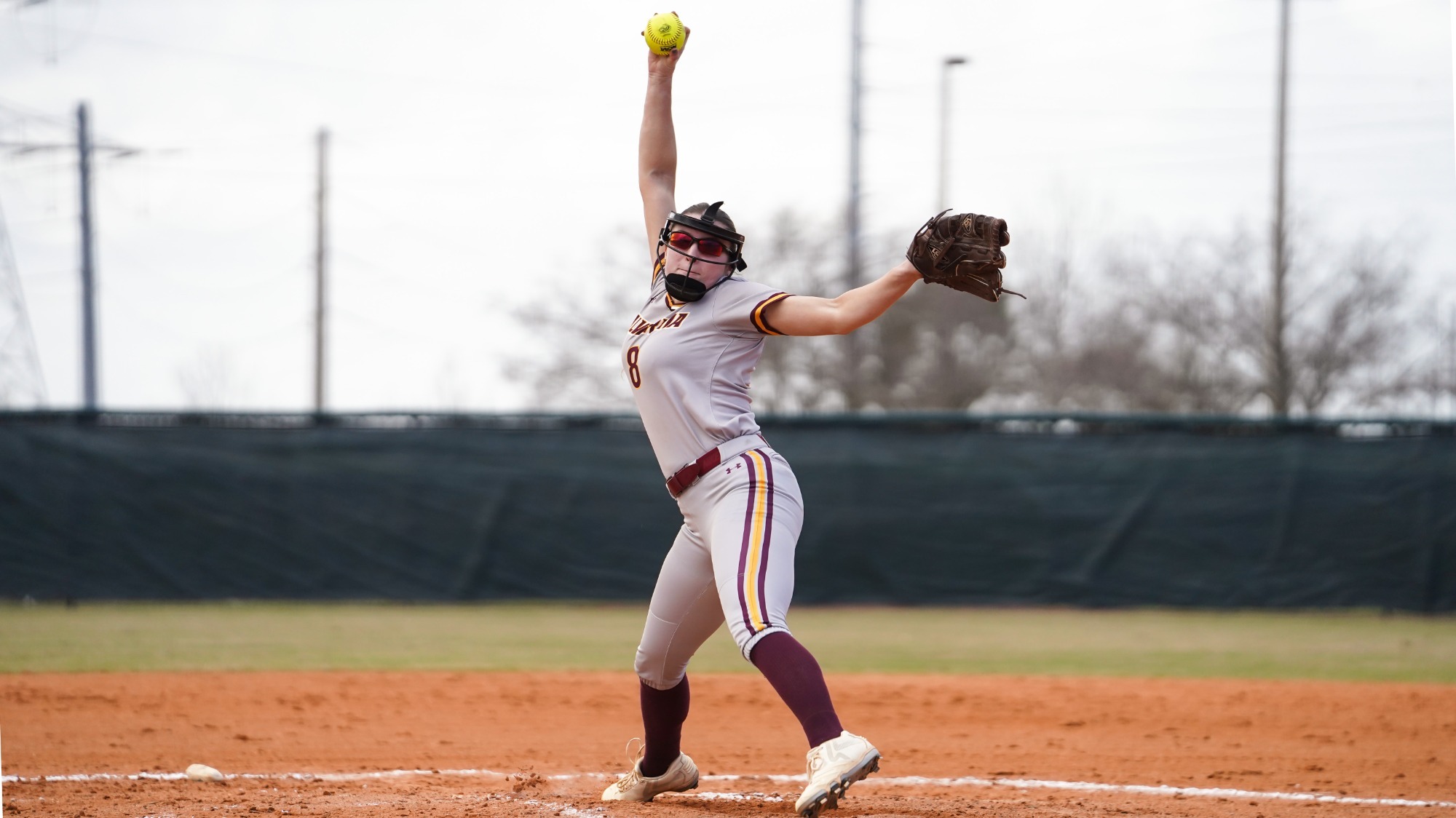 Natalie Berwick pitches against Adrian