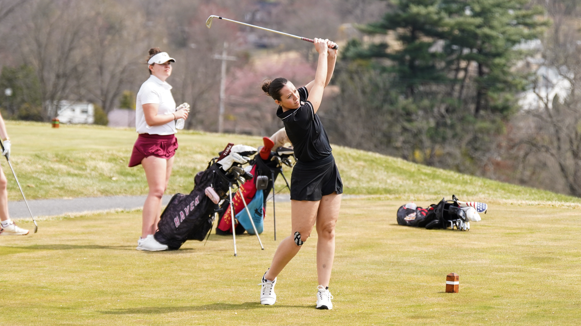 Cassidy Miksich takes a shot off the tee