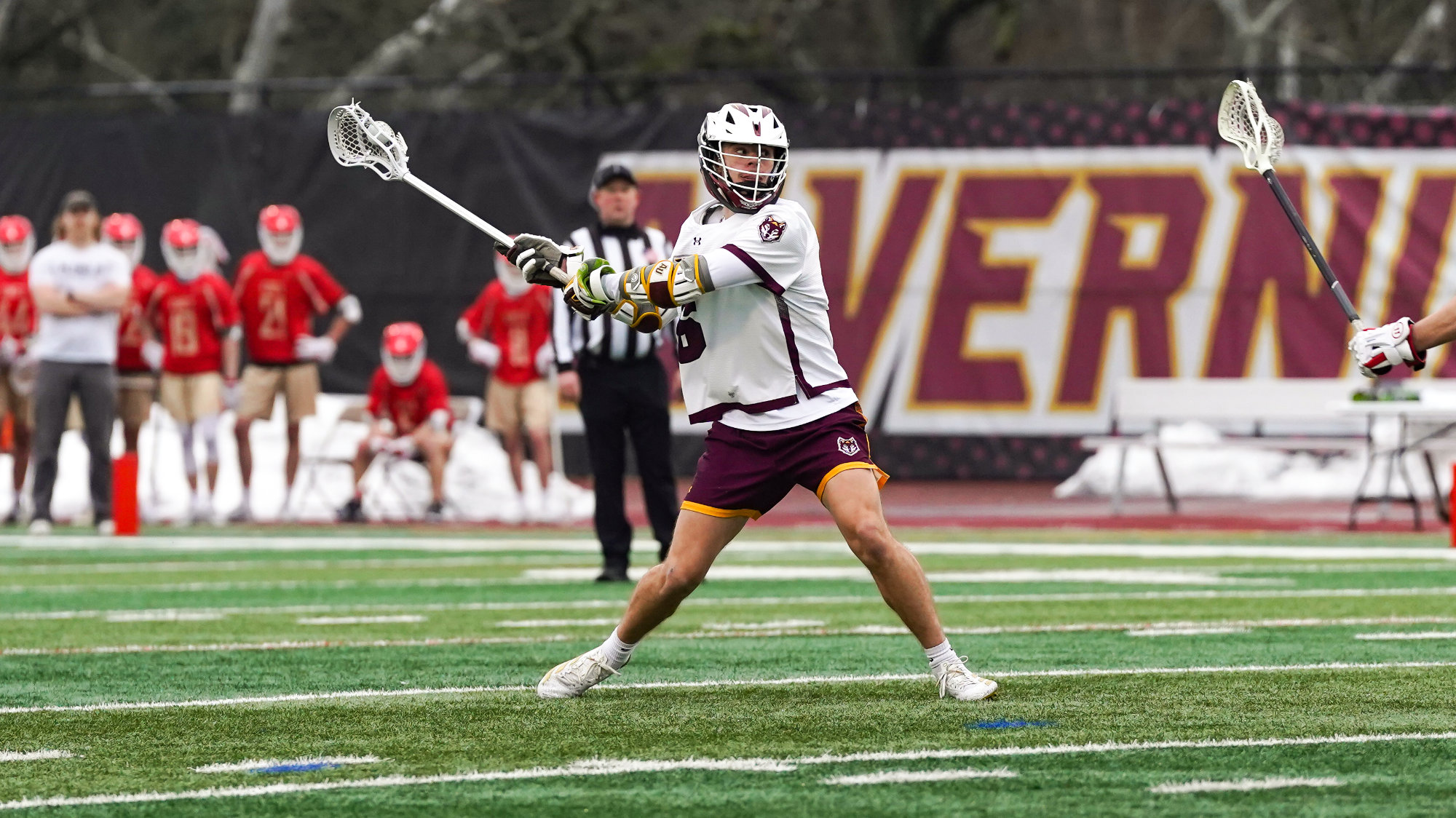 Ethan McManus takes a long shot on goal