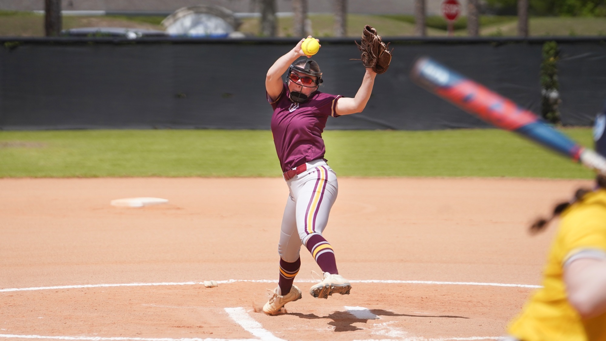 Natalie Berwick pitches against Simmons