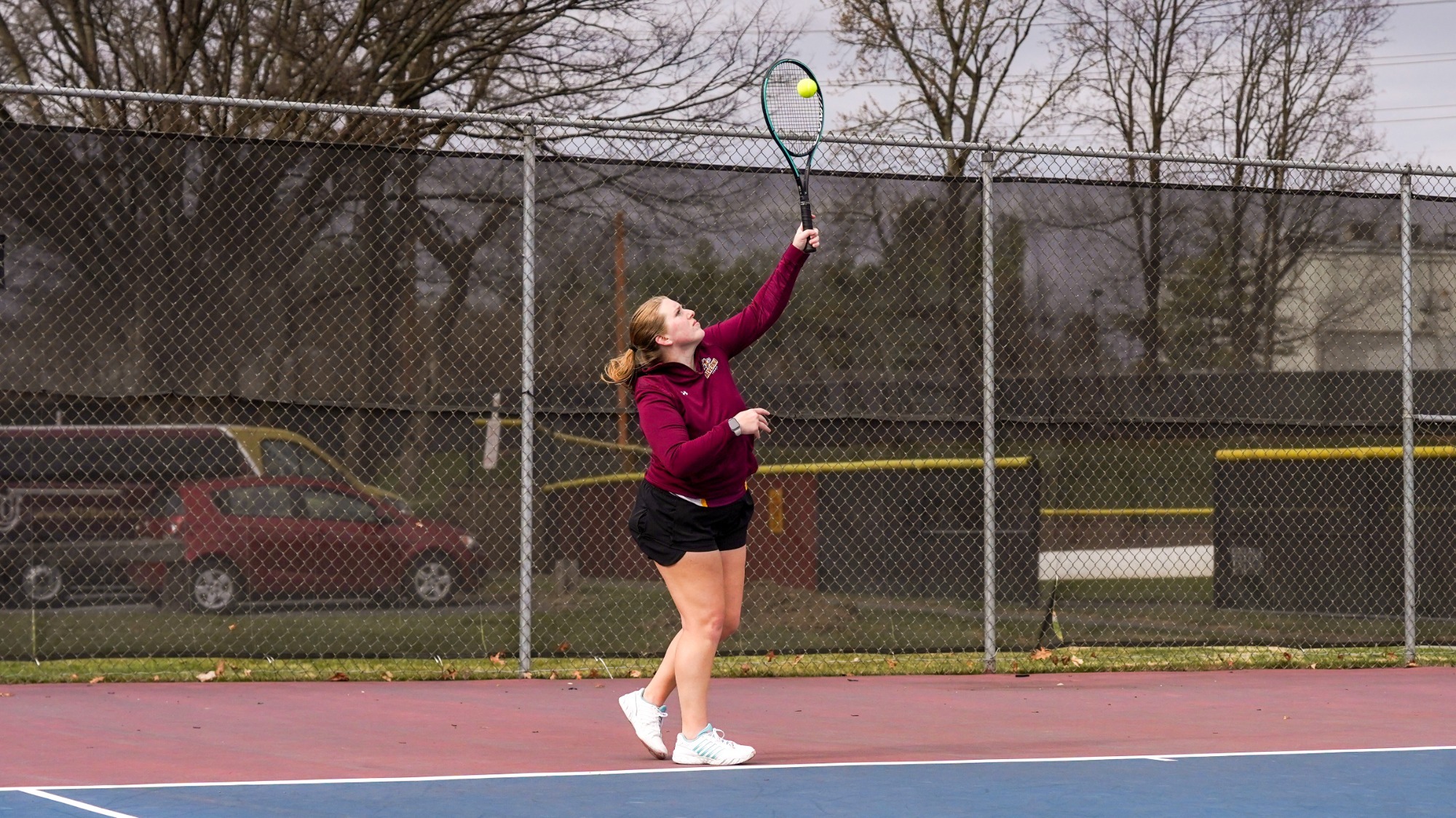 Jillian Laughman serves against Kutztown