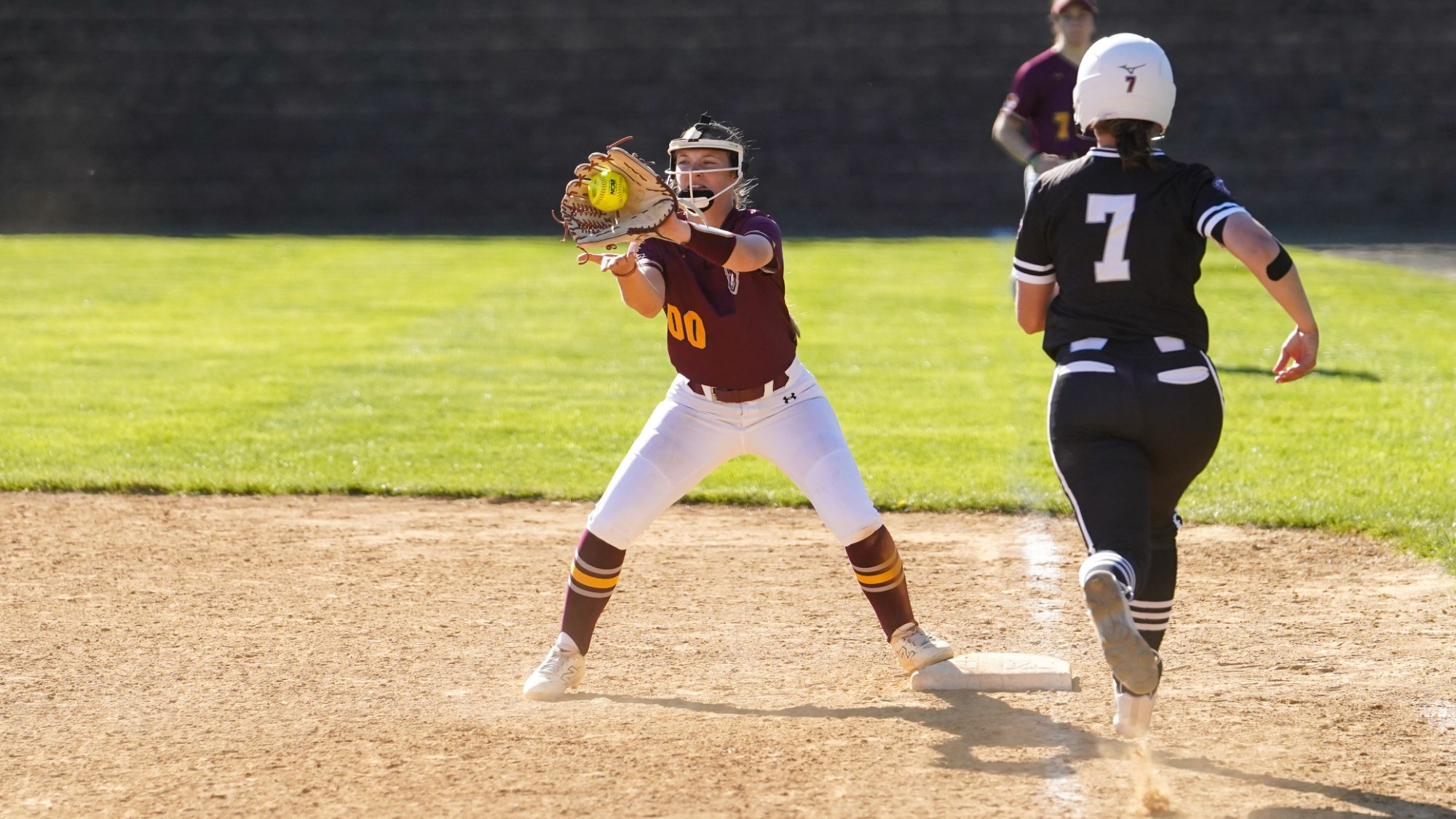 Kalli Bunnell catches her opponent out at first