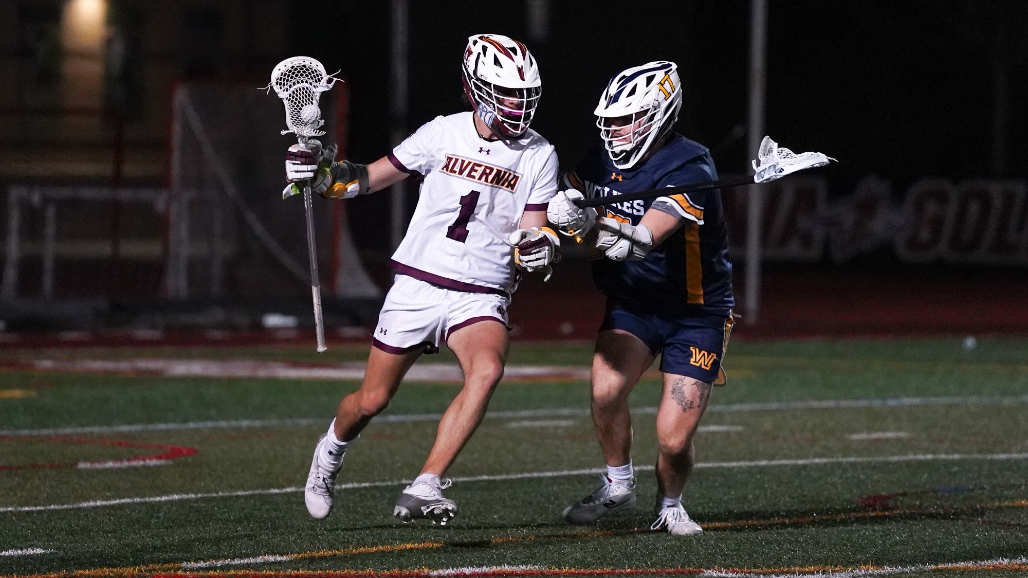 Charles Oberman drives on goal