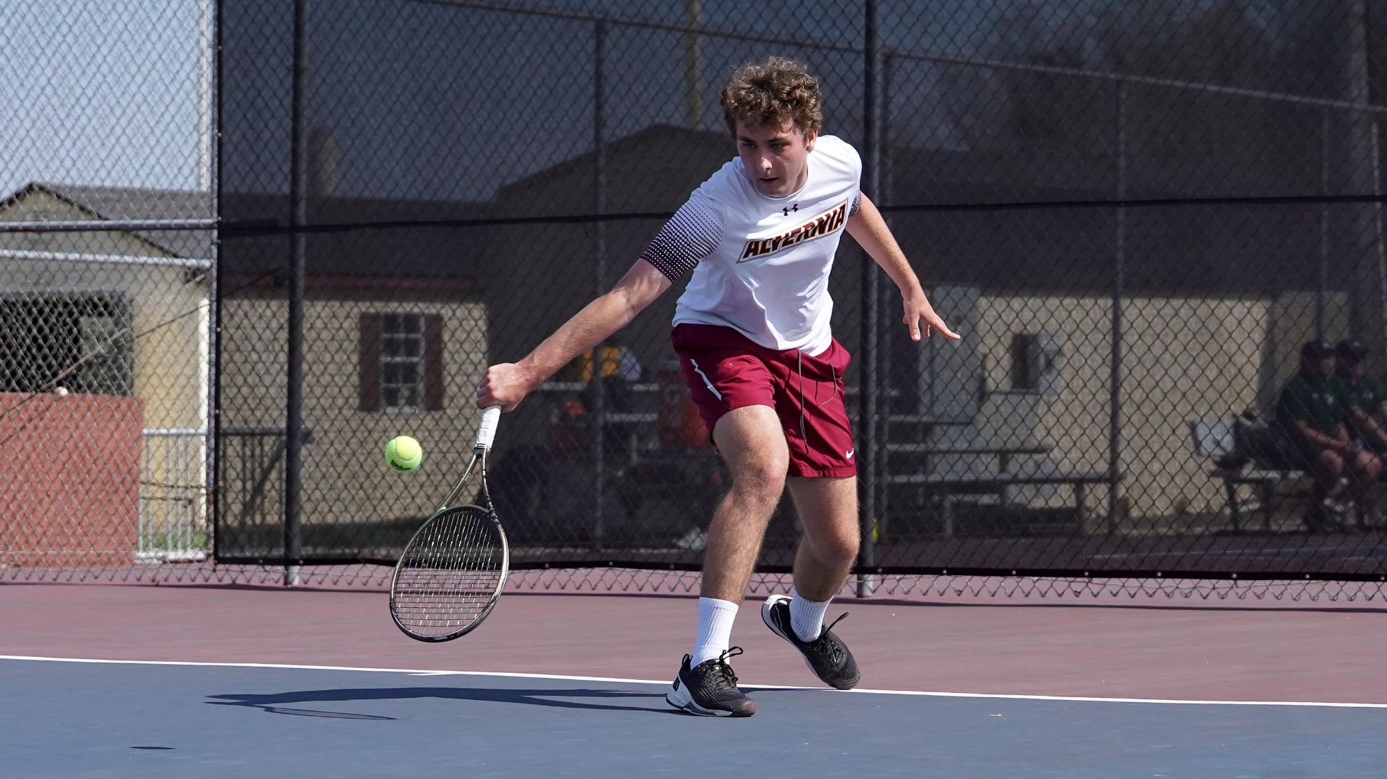 Lucas Montello returns a serve