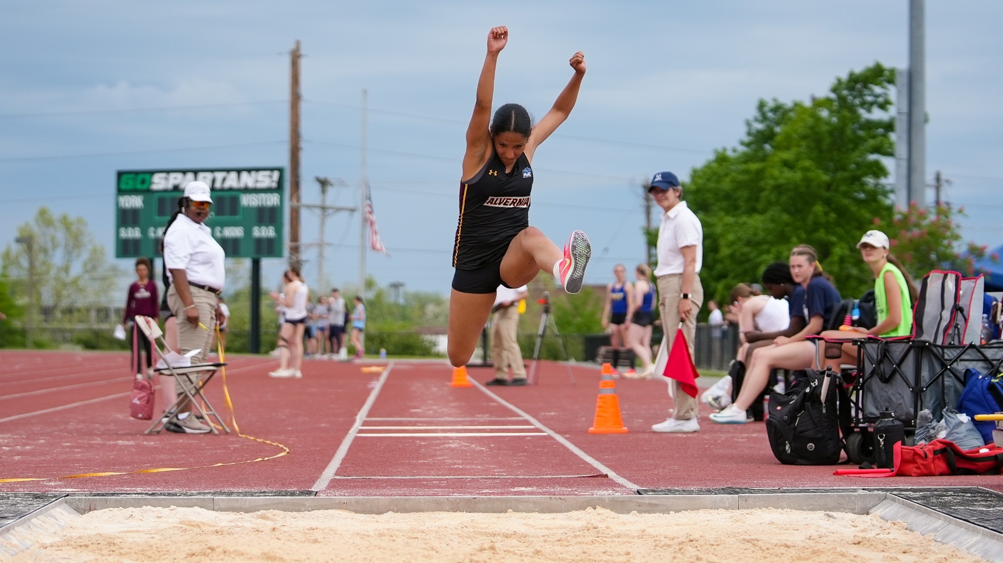 Angelise Rodriguez makes a long jump attempt