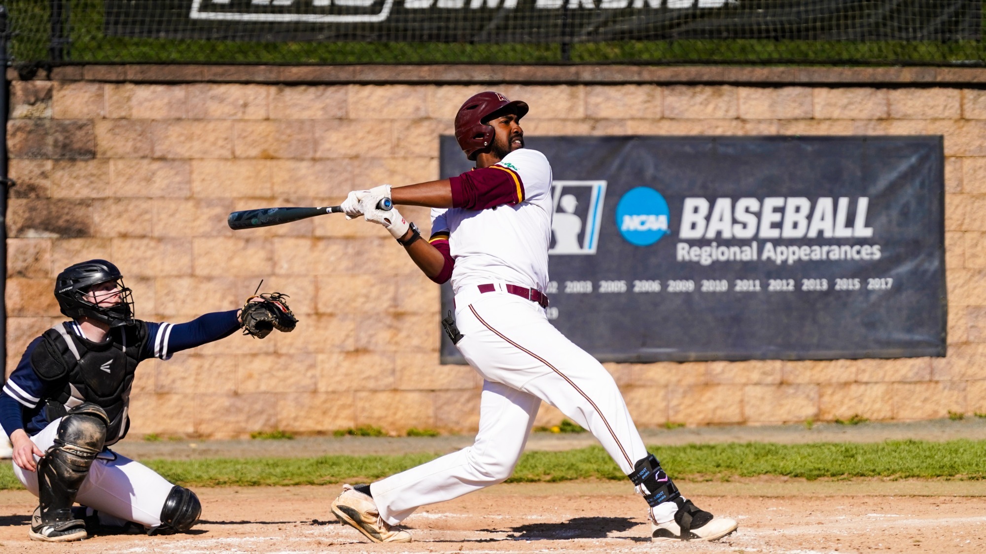 Harold Ivery III takes a swing at a pitch in Angelica Park. 