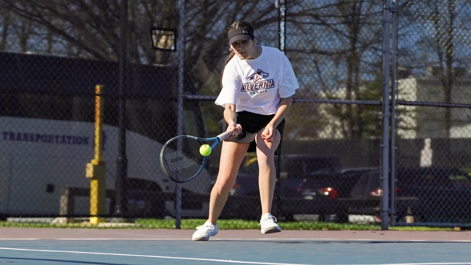 Jamielyn Kelly returns a serve