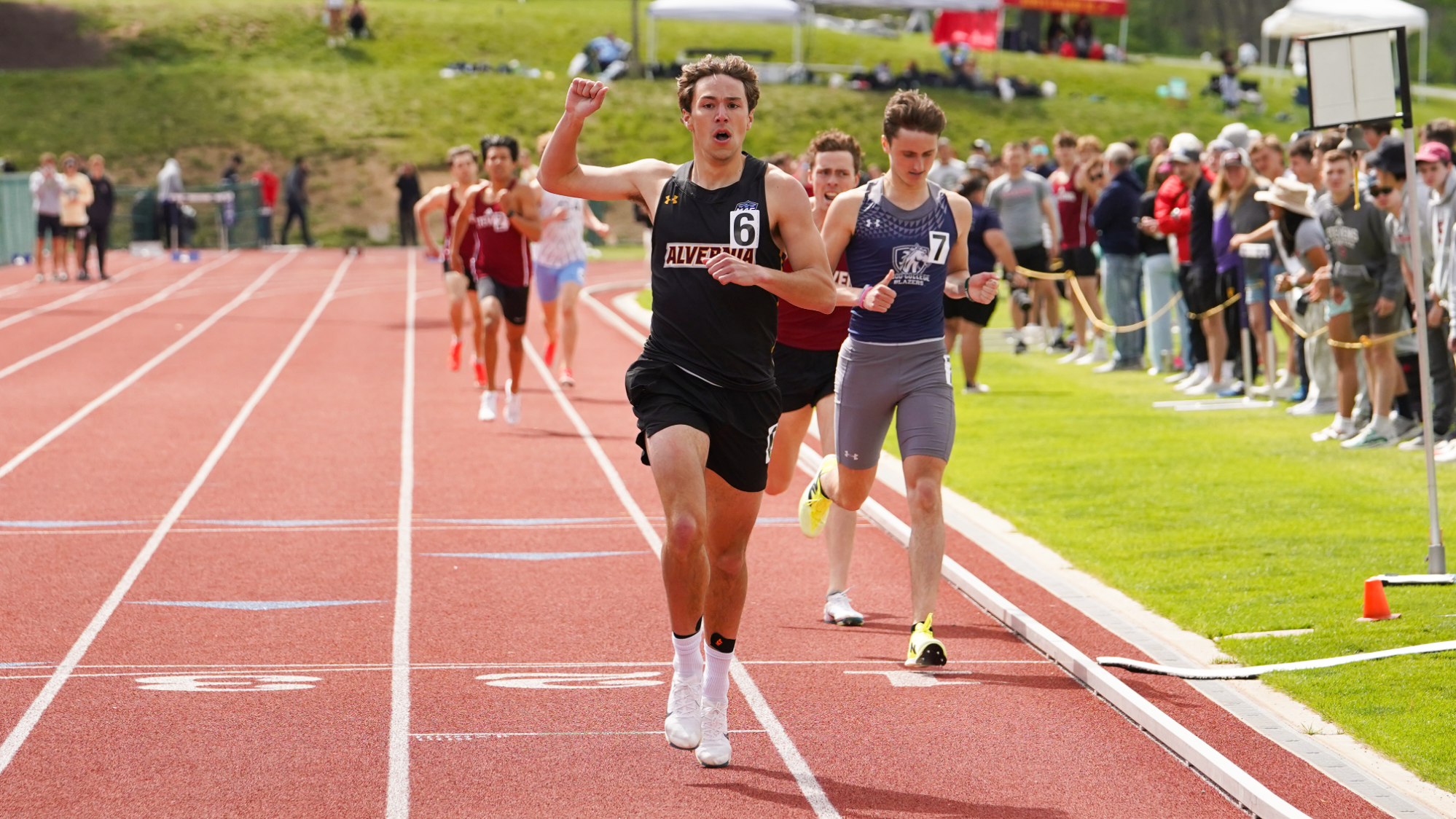 Spencer Hahn finishes first in the 800 meter