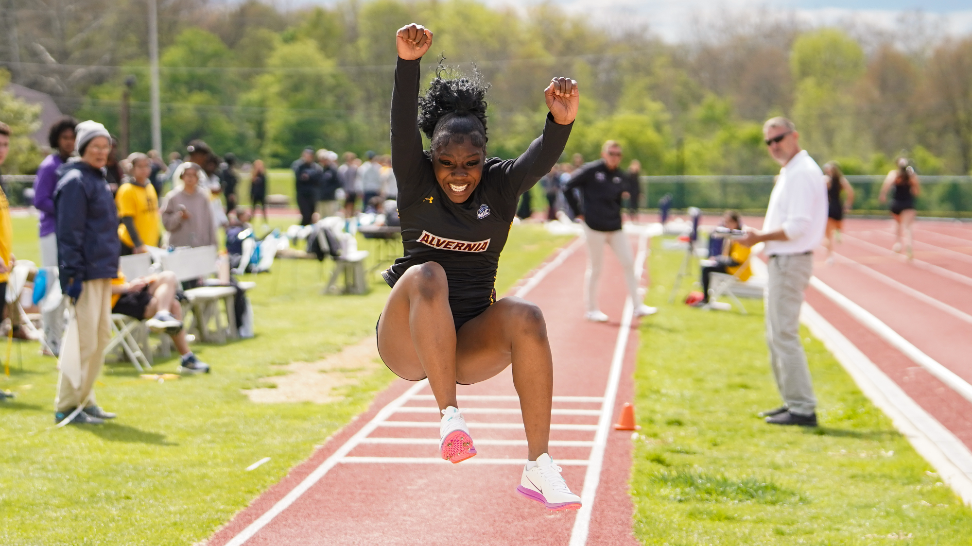 Britney Anyia attempts a triple jump