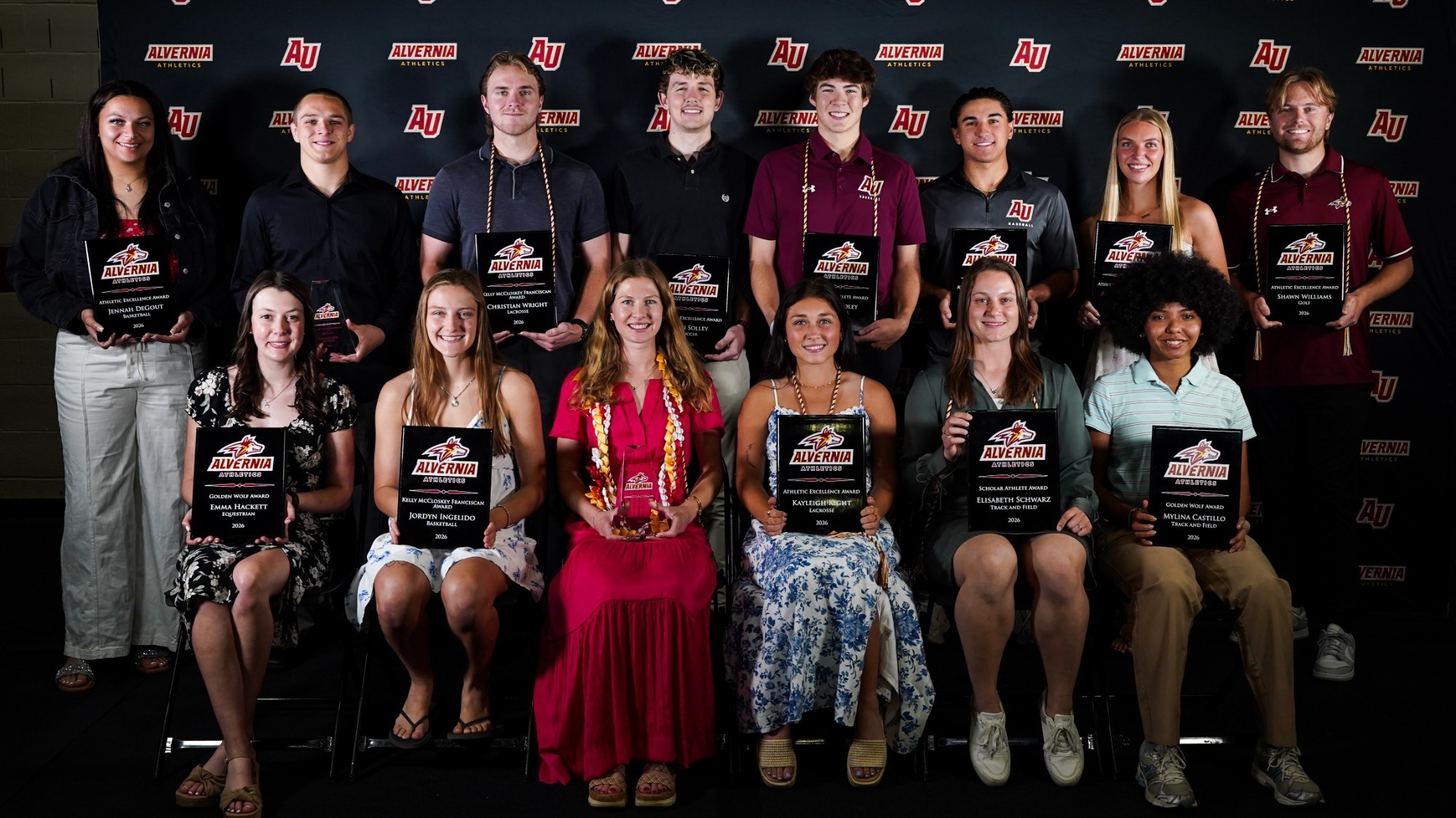 Senior Sutdent-Athletes pose with their respective award plaques at the Alvernia Senior Athlete Award Ceremony.
