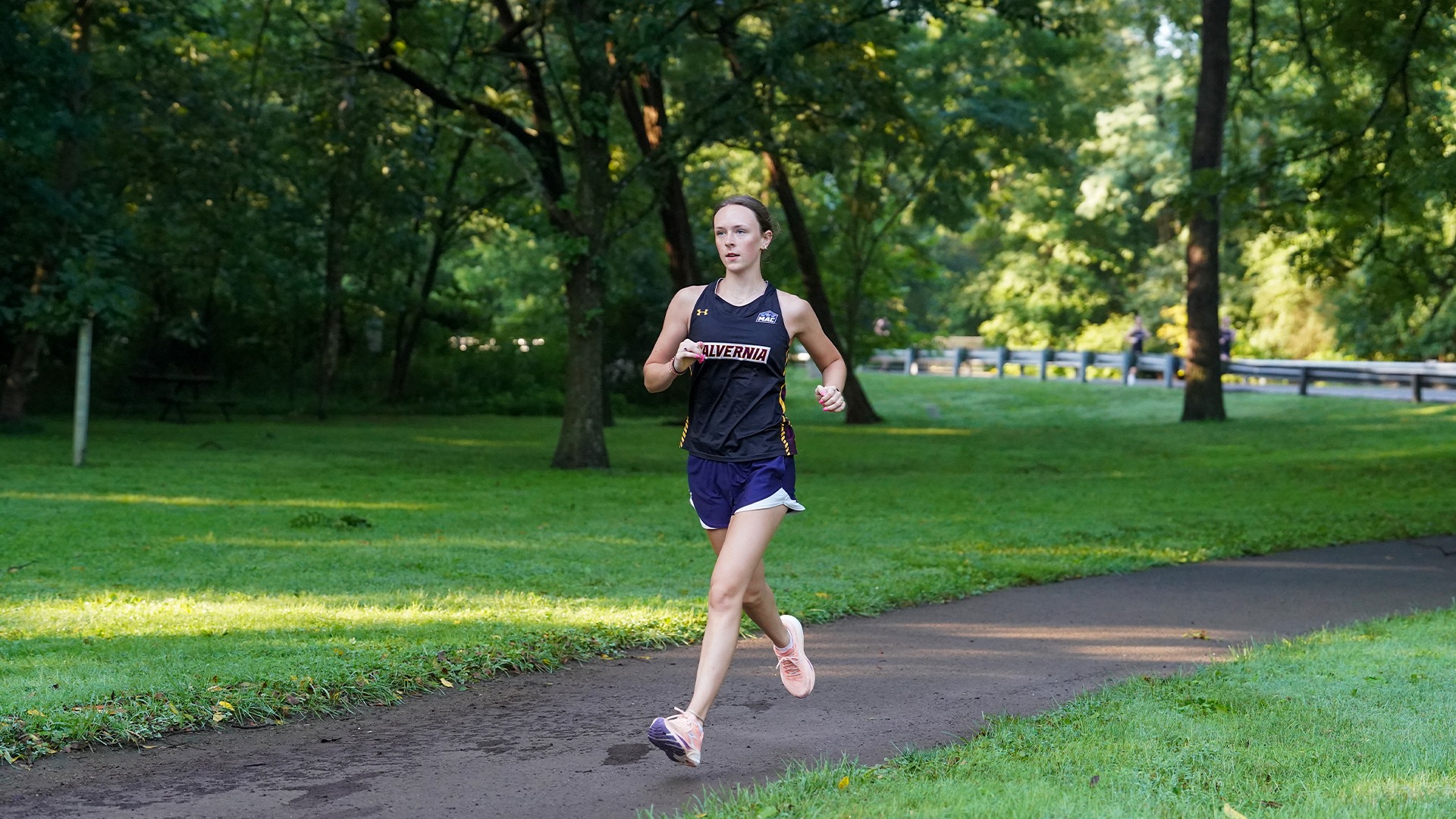 Sarina Neiswender running in Angelica Park