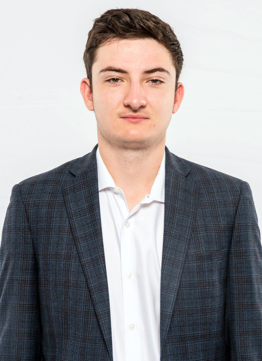 Headshot of Men's and Women's Golf Assistant Coach and 2020-21 Hitchcock Fellow Nick Sullivan