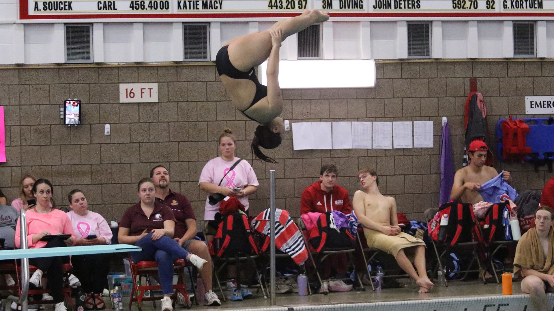 Katie Brown dives during a 2025-26 Augsburg women's swimming and diving meet.