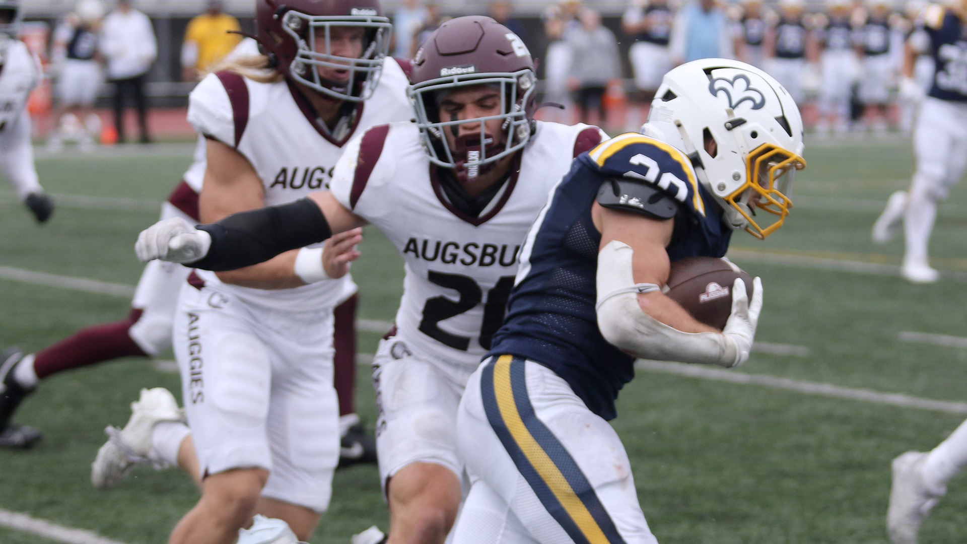 Foster Mulvehill makes a tackle during a 2025 Augsburg football game.