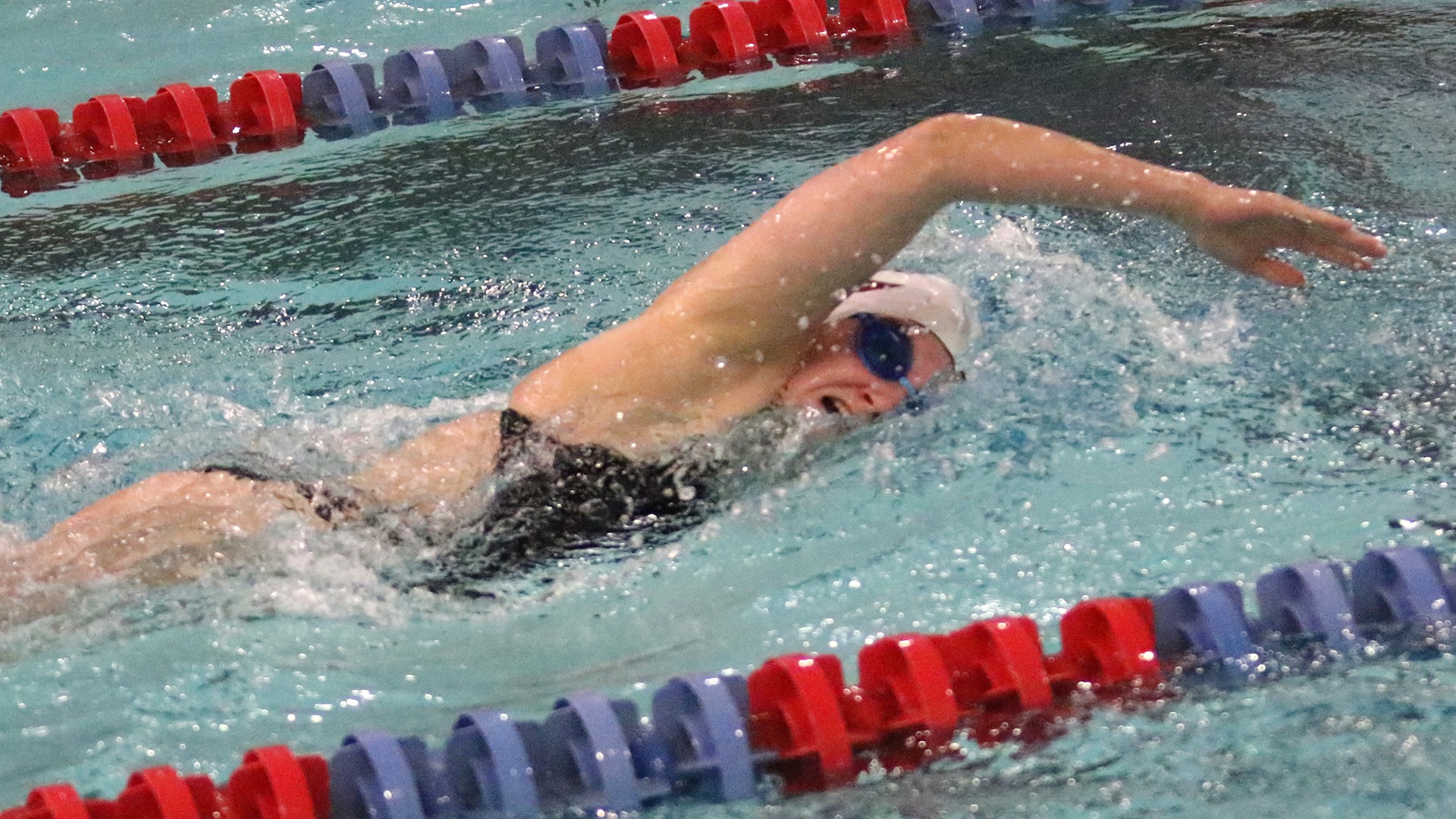 Danielle Hobbs swims the freestyle during a 2025-26 Augsburg University women's swimming and diving event.