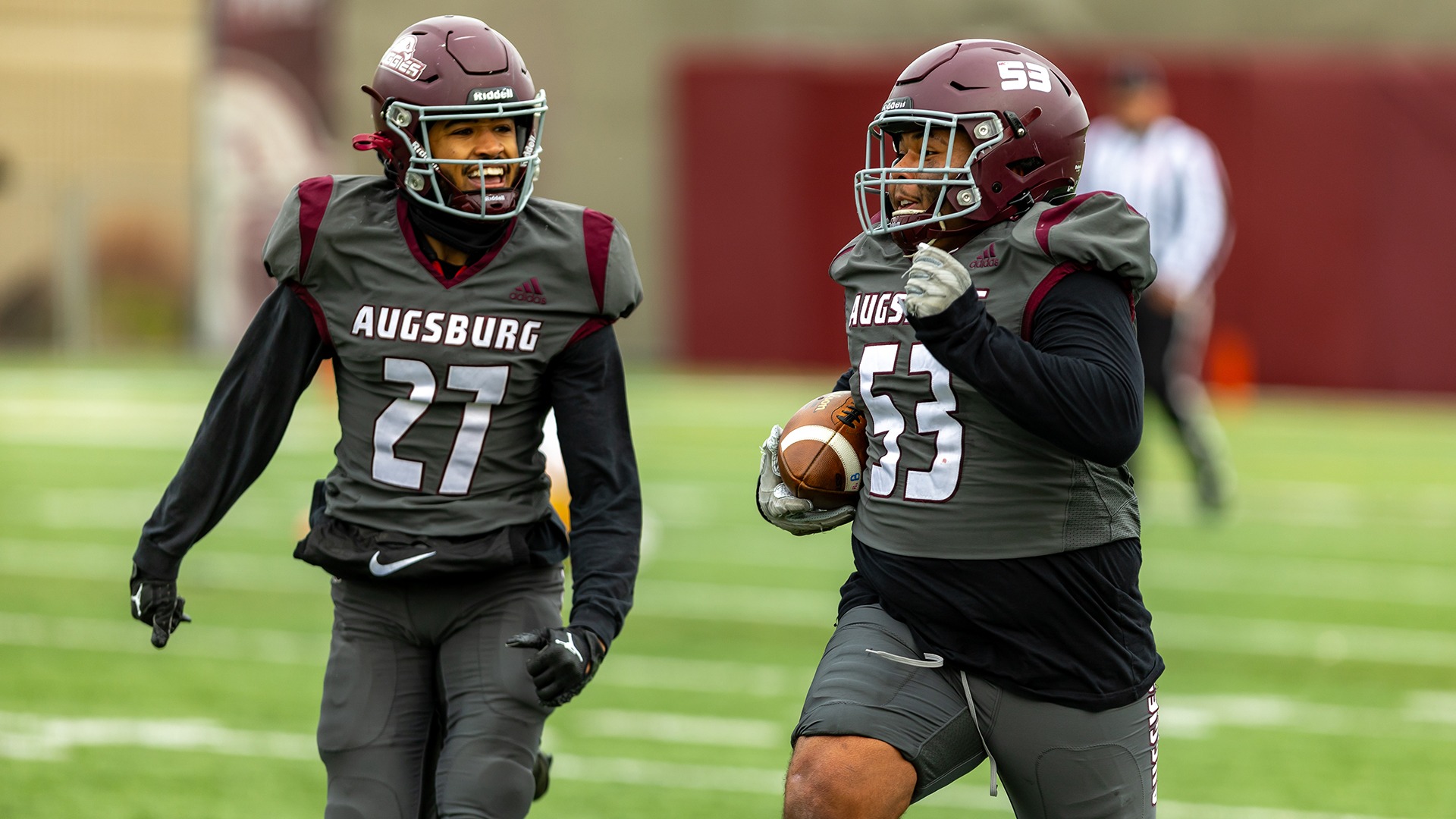 RJ Chakolis returns a fumble for a touchdown during a 2025 Augsburg football game.