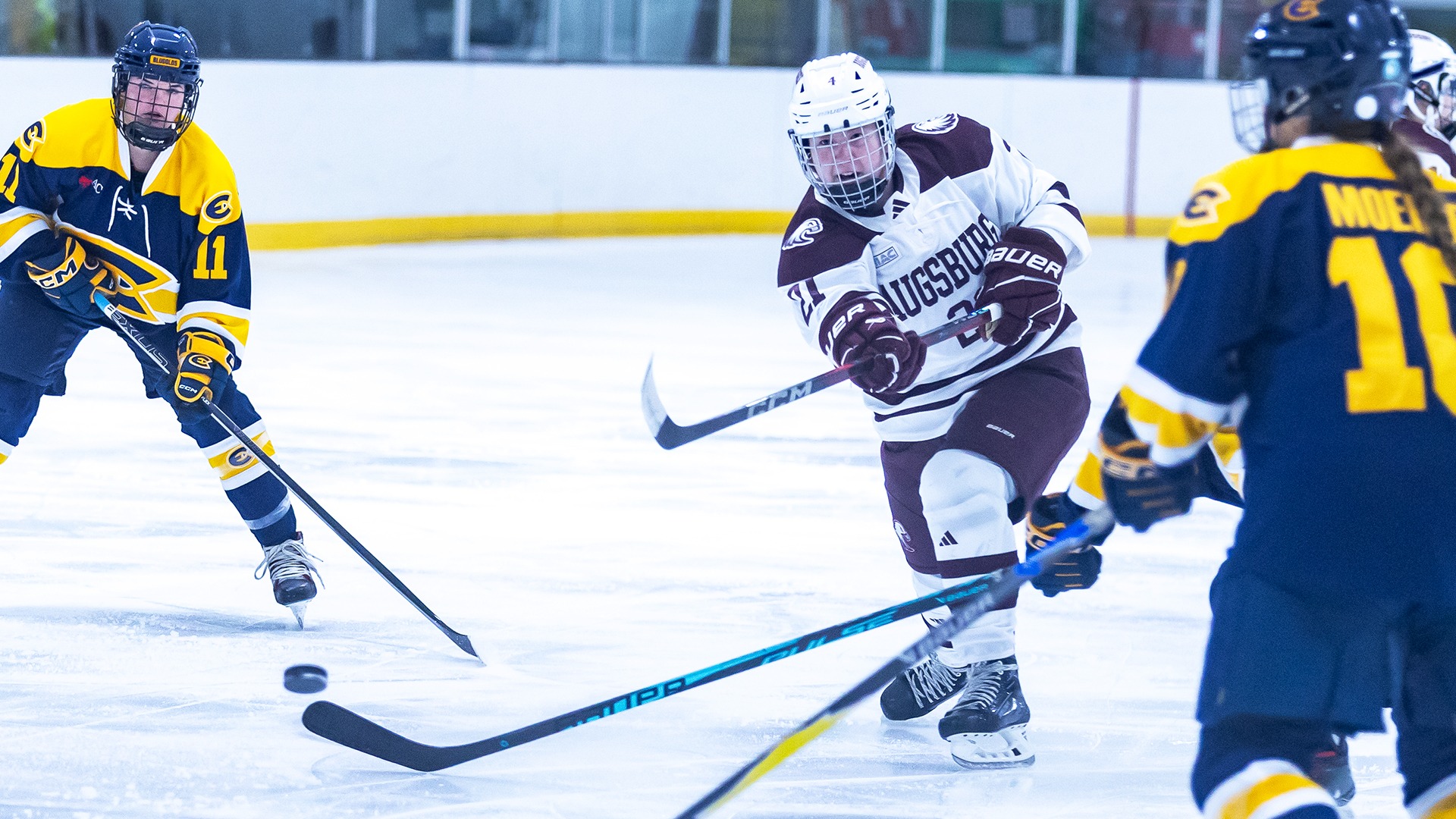 Nora Stepan fires a shot during a 2025-26 Augsburg women's hockey game.