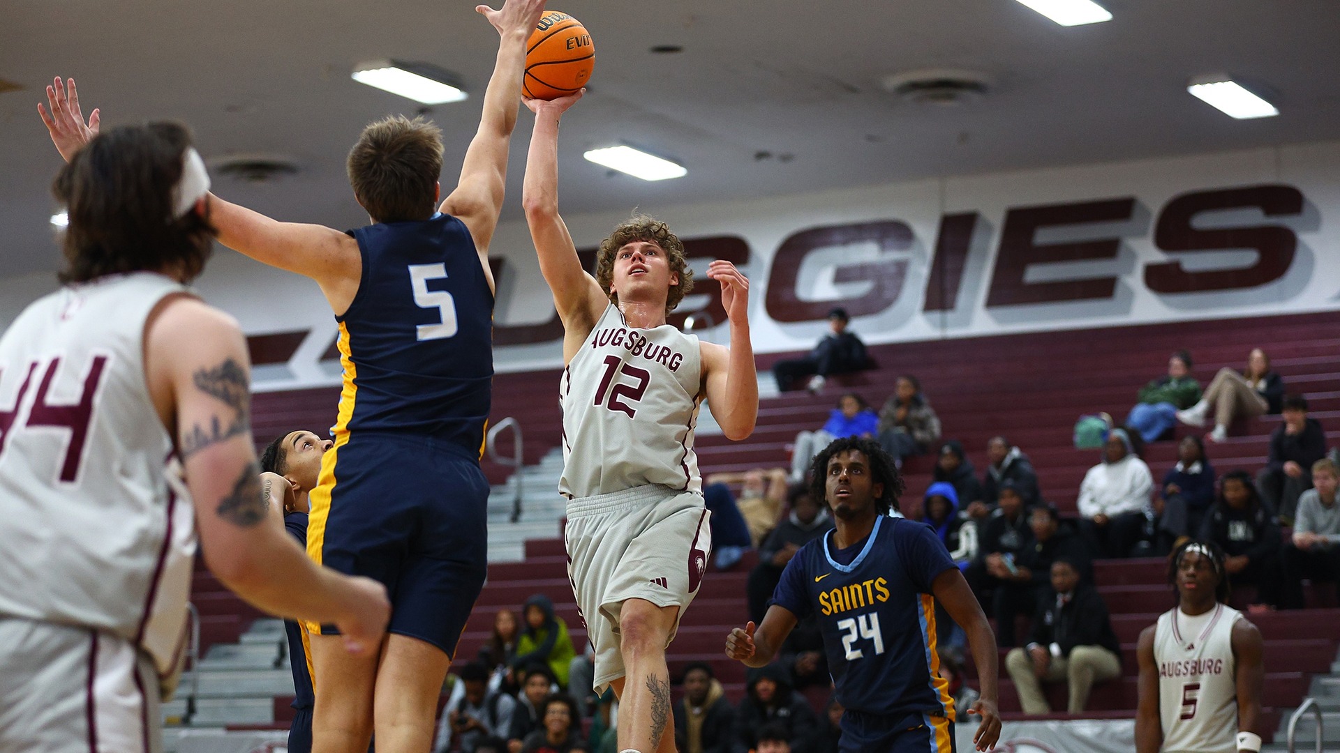 JJ Semanko puts up a shot during a 2025-26 Augsburg men's basketball game.