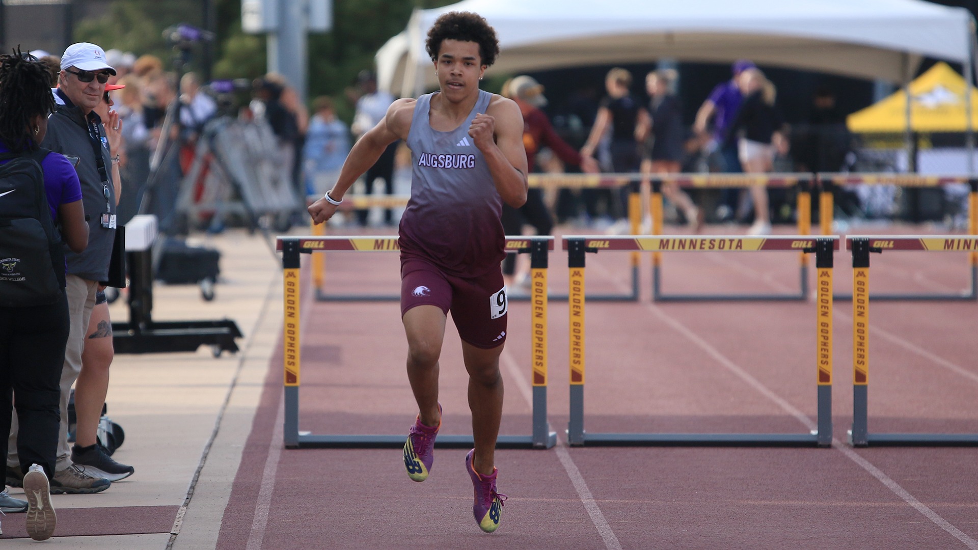 Jamir Horton sprints during a 2025 Augsburg track and field meet.