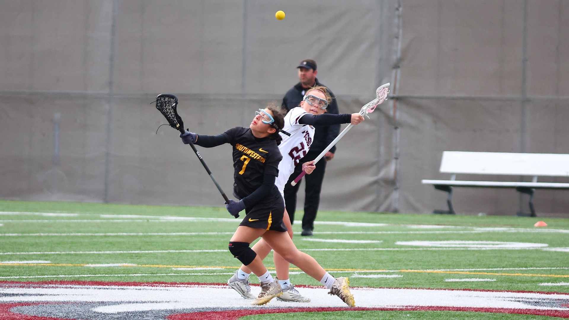 Leila Klym takes a draw control during a 2025 Augsburg women's lacrosse game.