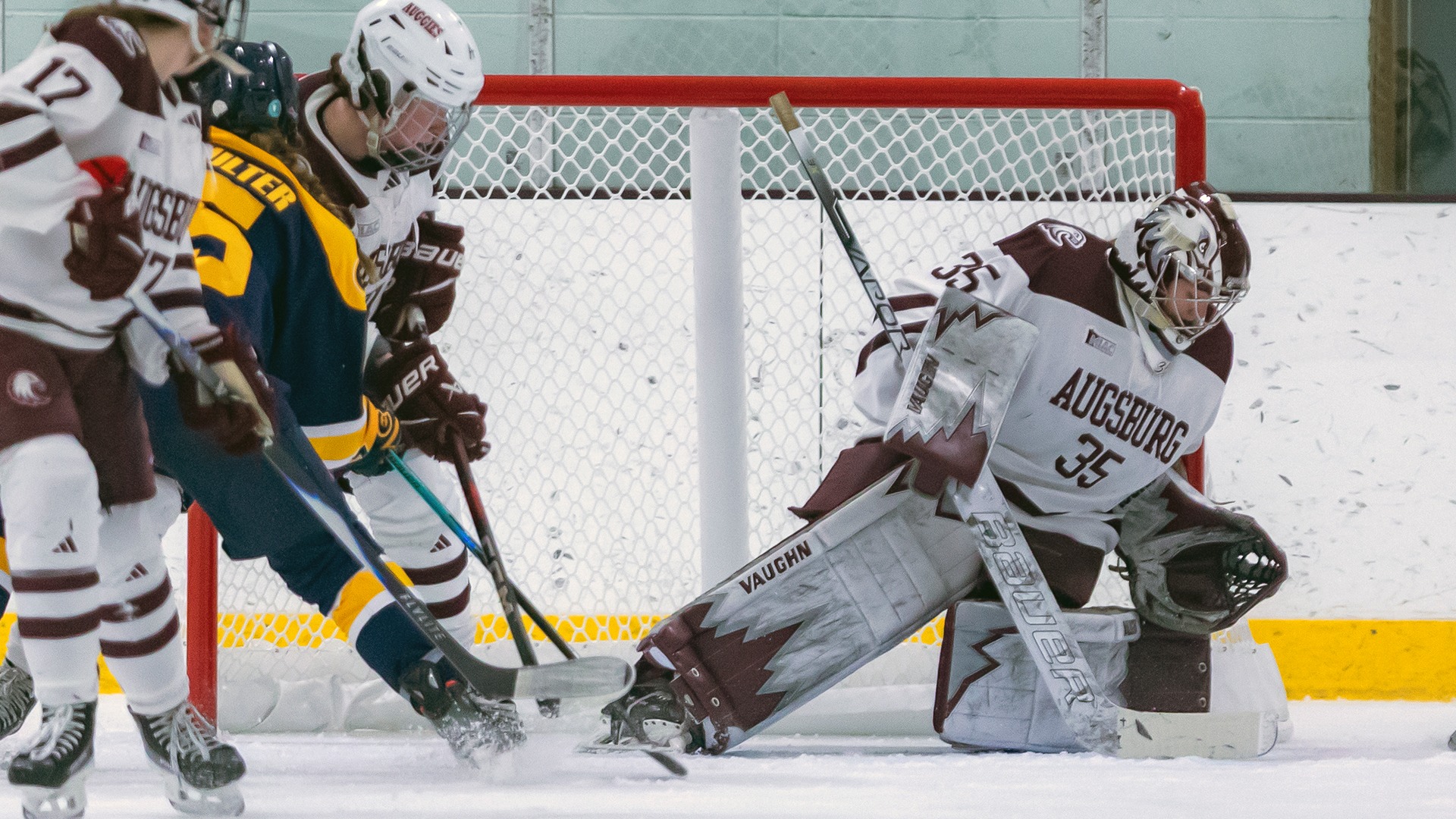 Goalie Marissa Paaske makes a save during a 2025-26 Augsburg women's hockey game.
