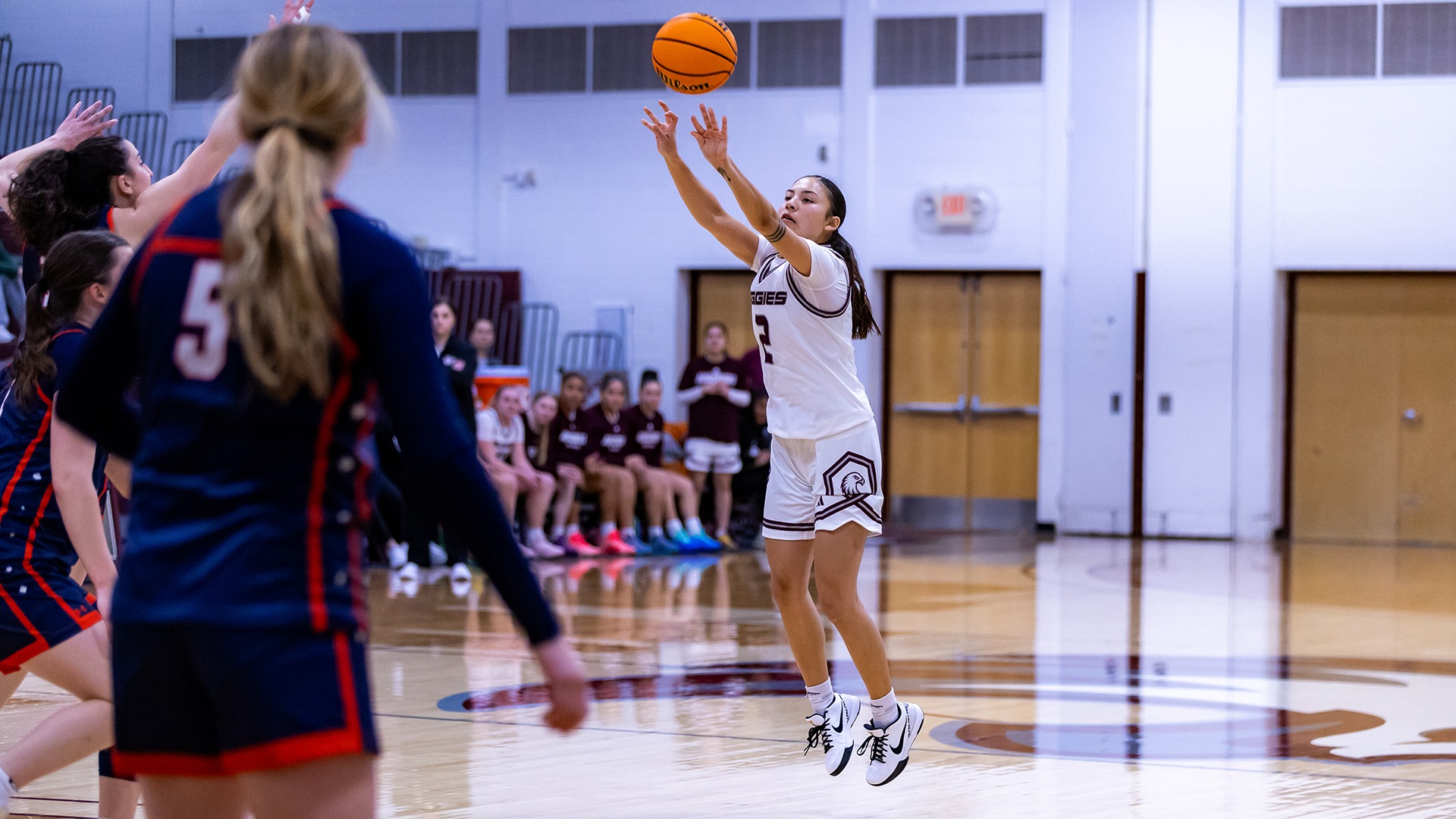 Wakinyela Bear takes a shot during a 2025-26 Augsburg women's basketball game.