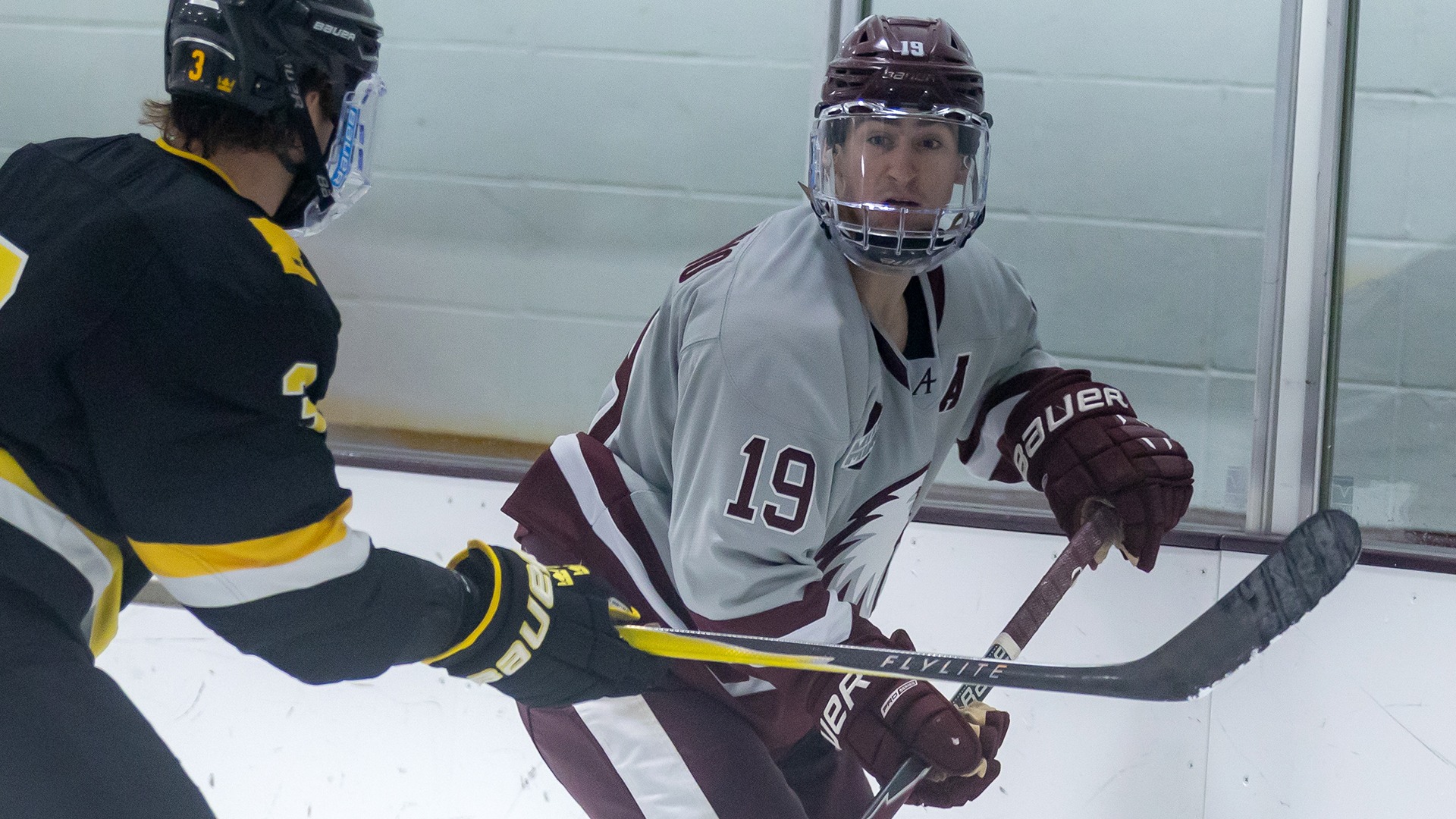 Nick Catalano faces a defender during a 2025-26 Augsburg men's basketball game.