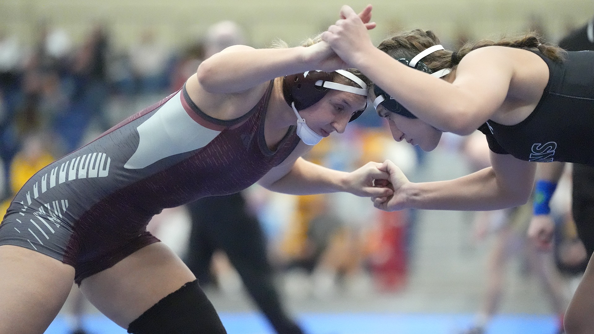 Hannah Wigern battles an opponent during a 2025-26 Augsburg women's wrestling match.