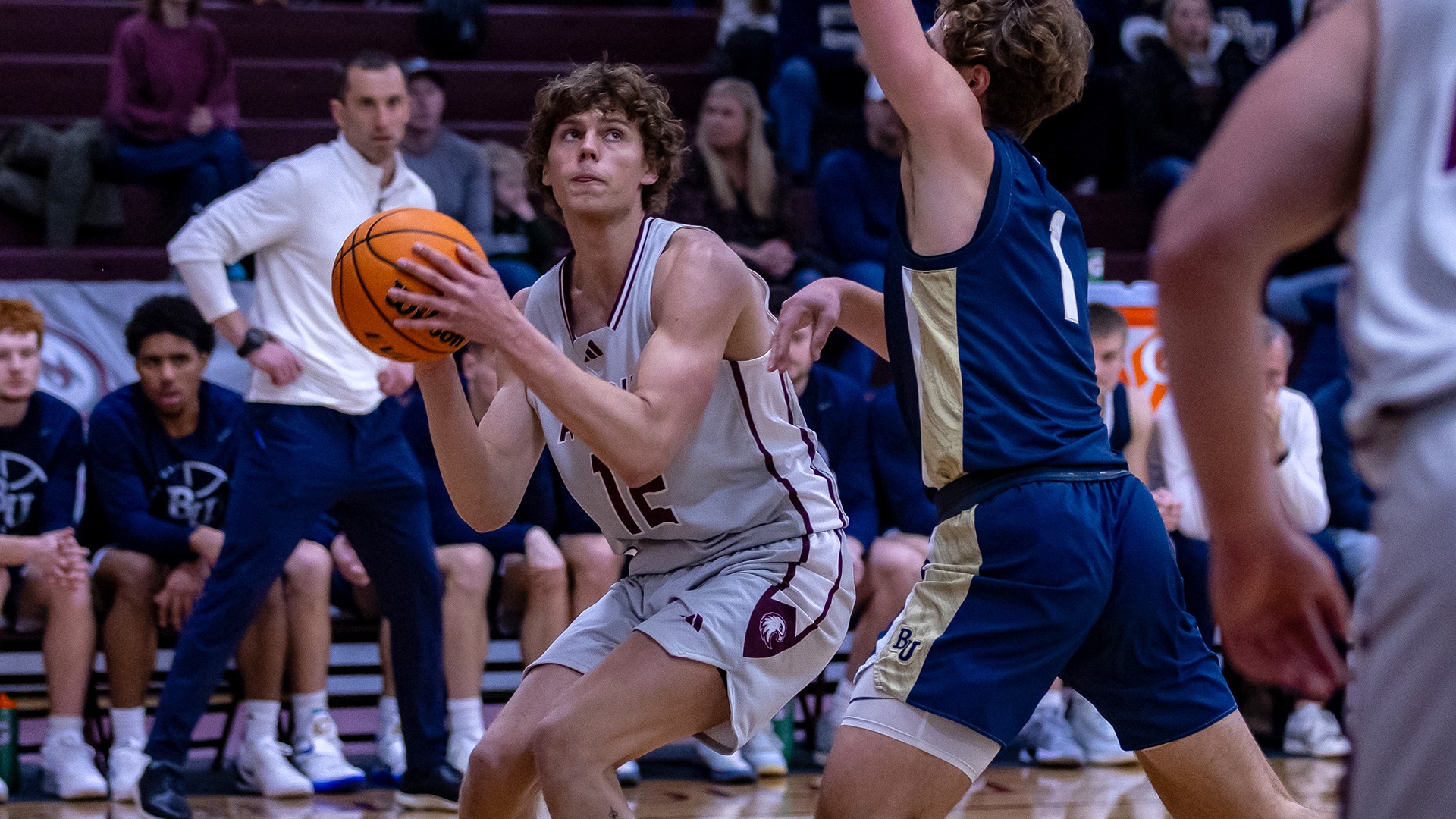 JJ Semanko gets set to fire a shot during a 2025-26 Augsburg men's basketball game.