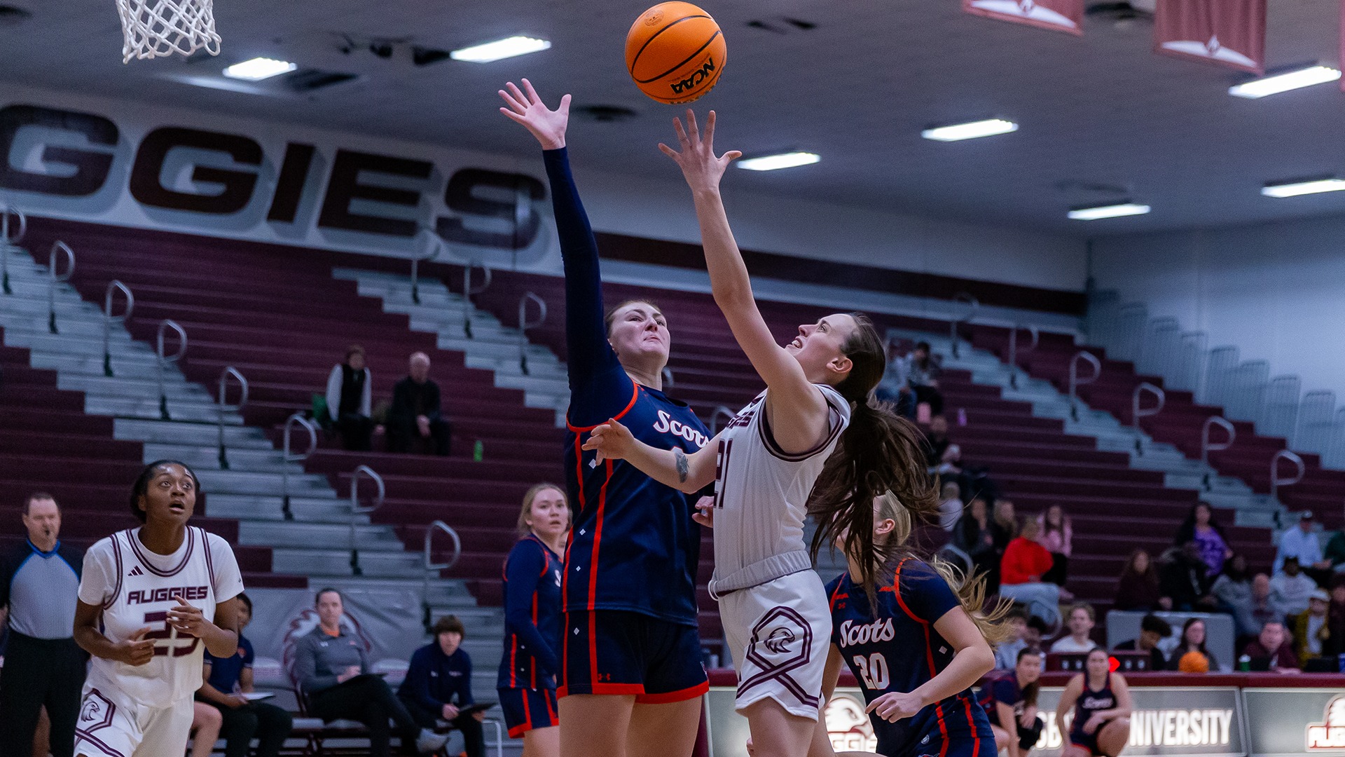 Sydney Hazuga puts up a layup during a 2025-26 Augsburg women's basketball game.
