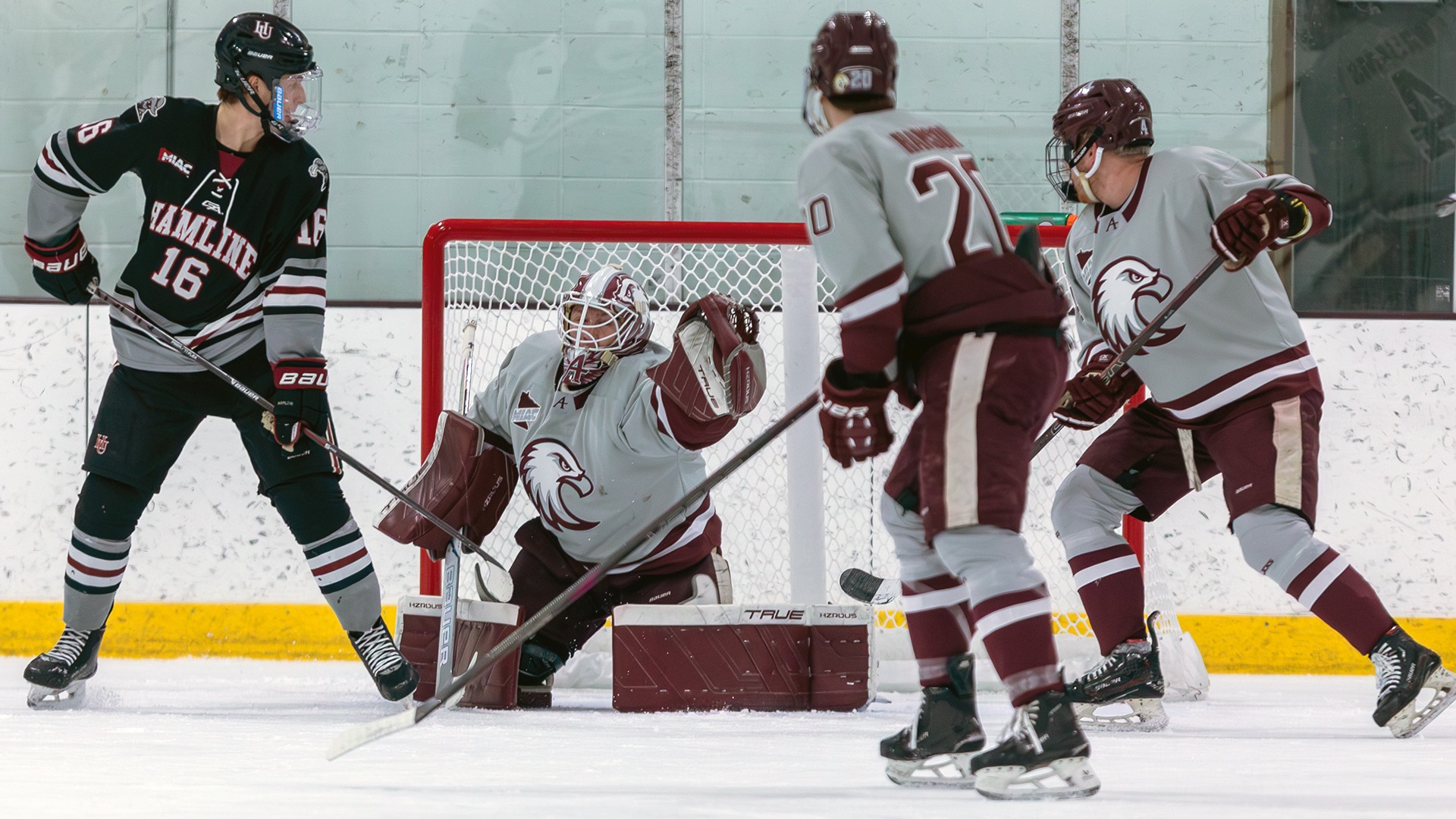 Alex Timmons makes a save during a 2025-26 Augsburg men's hockey game.