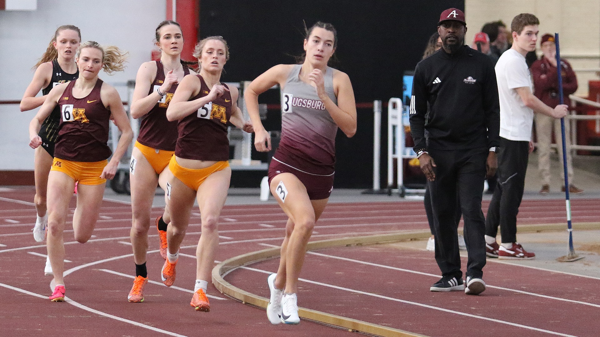Allison Hookom runs during a 2025 Augsburg women's track and field meet.