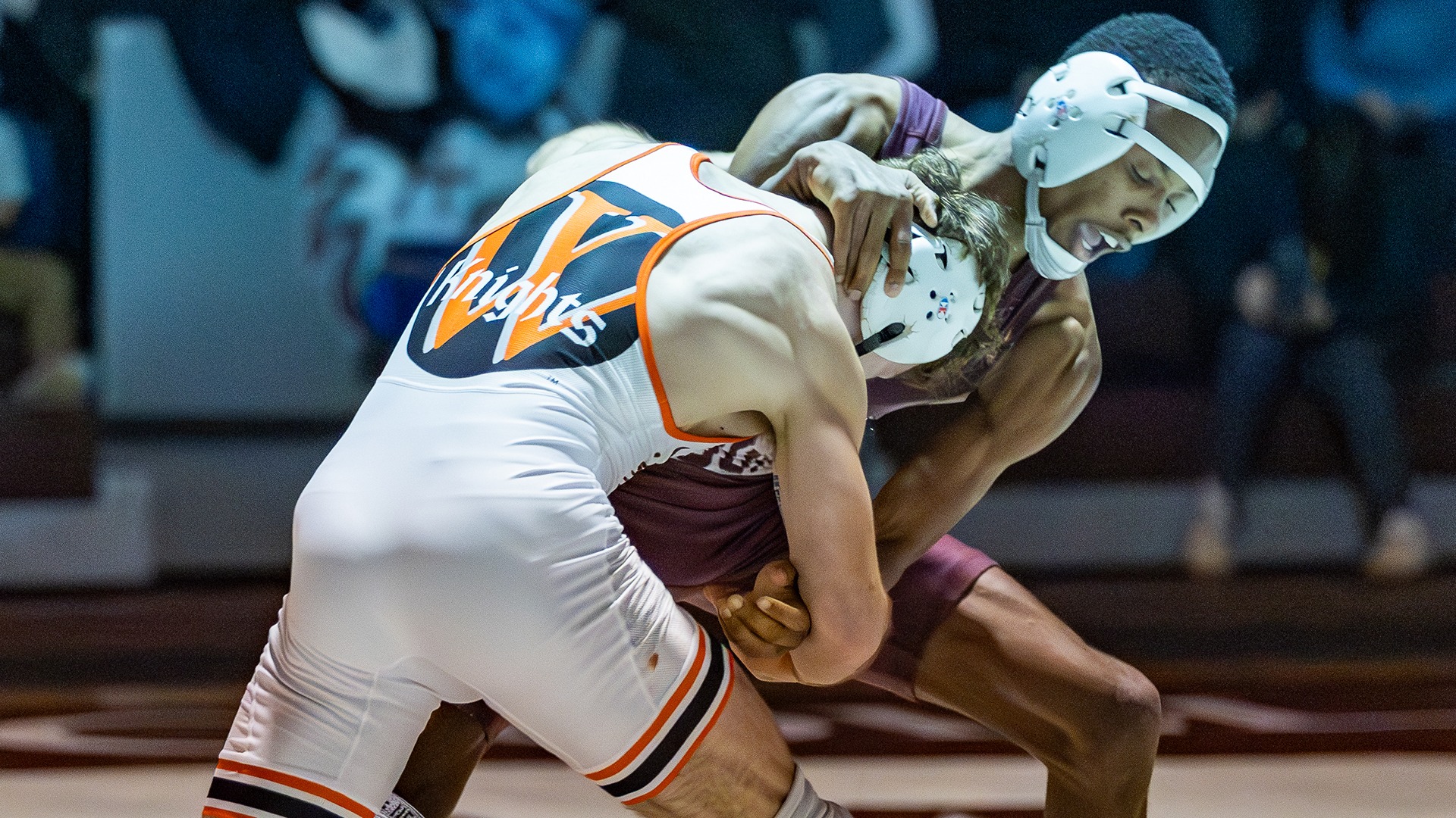 Keno Vanier attacks an opponent during a 2025-26 Augsburg men's wrestling meet.
