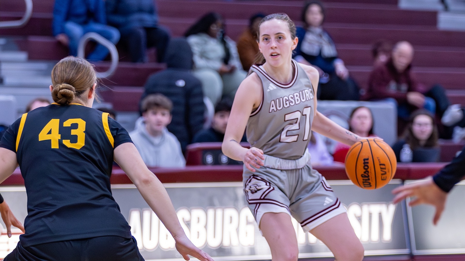 Sydney Hazuga handles the ball during a 2025-26 Augsburg women's basketball game.