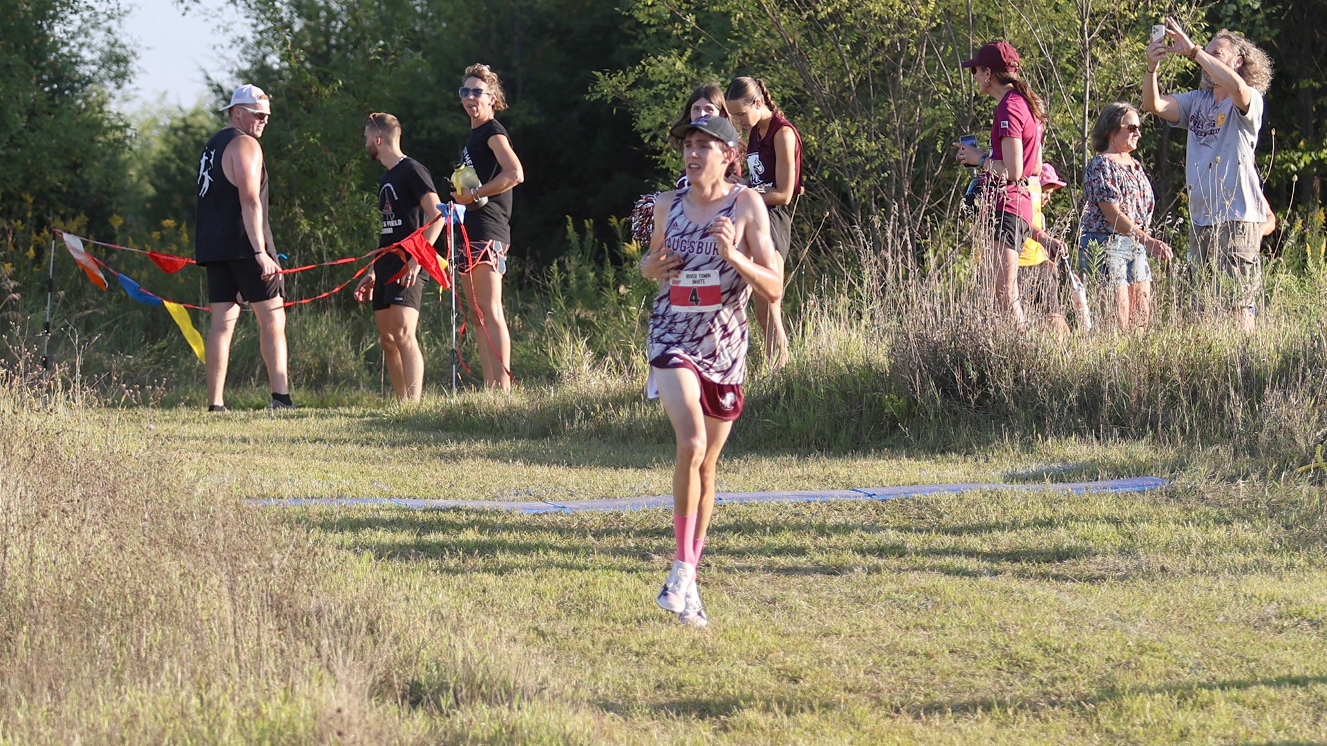 Lucien Randolph-Tarrant runs during a 2026 Augsburg cross country race.
