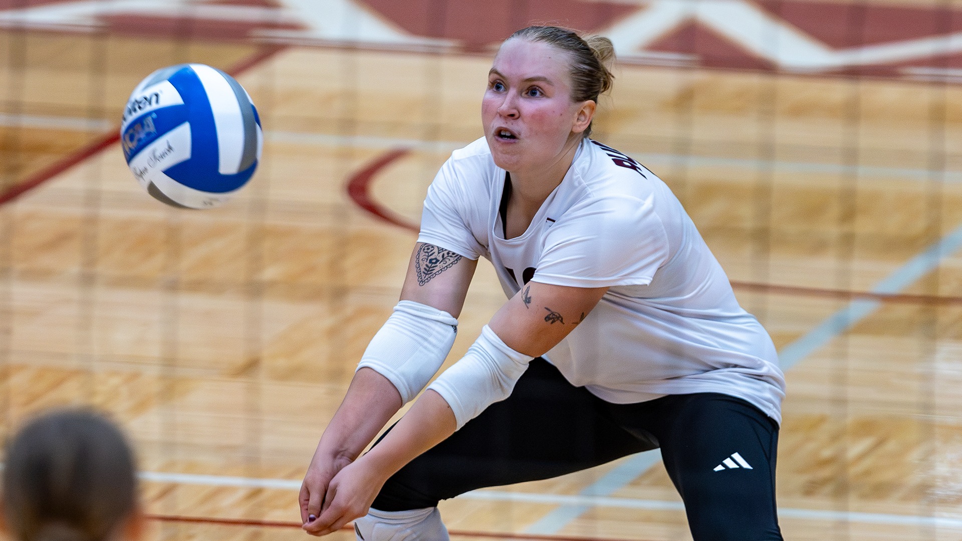 Maggie Lile returns a serve during a 2026 Augsburg volleyball match.